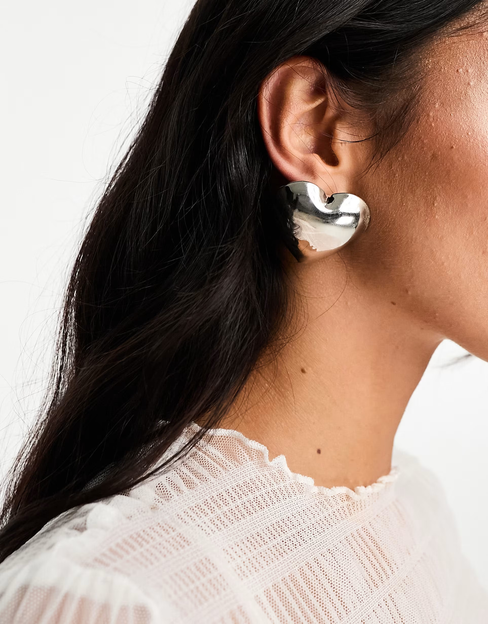 ASOS DESIGN stud earrings with oversized puff heart in silver tone | ASOS | ASOS (Global)