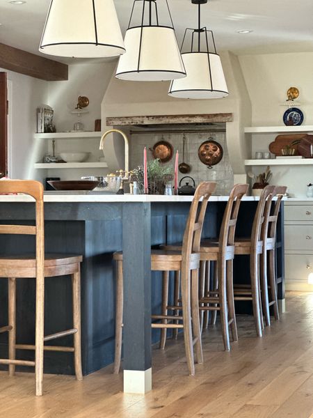 Kitchen, pottery barn bar stools, kitchen island stools, counter height stools, rejuvenation pendant dupe, drum pendant, copper pans, wood cutting board, Pottery barn cline counter stool, burnt umber, unlacquered brass faucet, brass bridge faucet, brass kitchen faucet 

#LTKfamily #LTKhome
