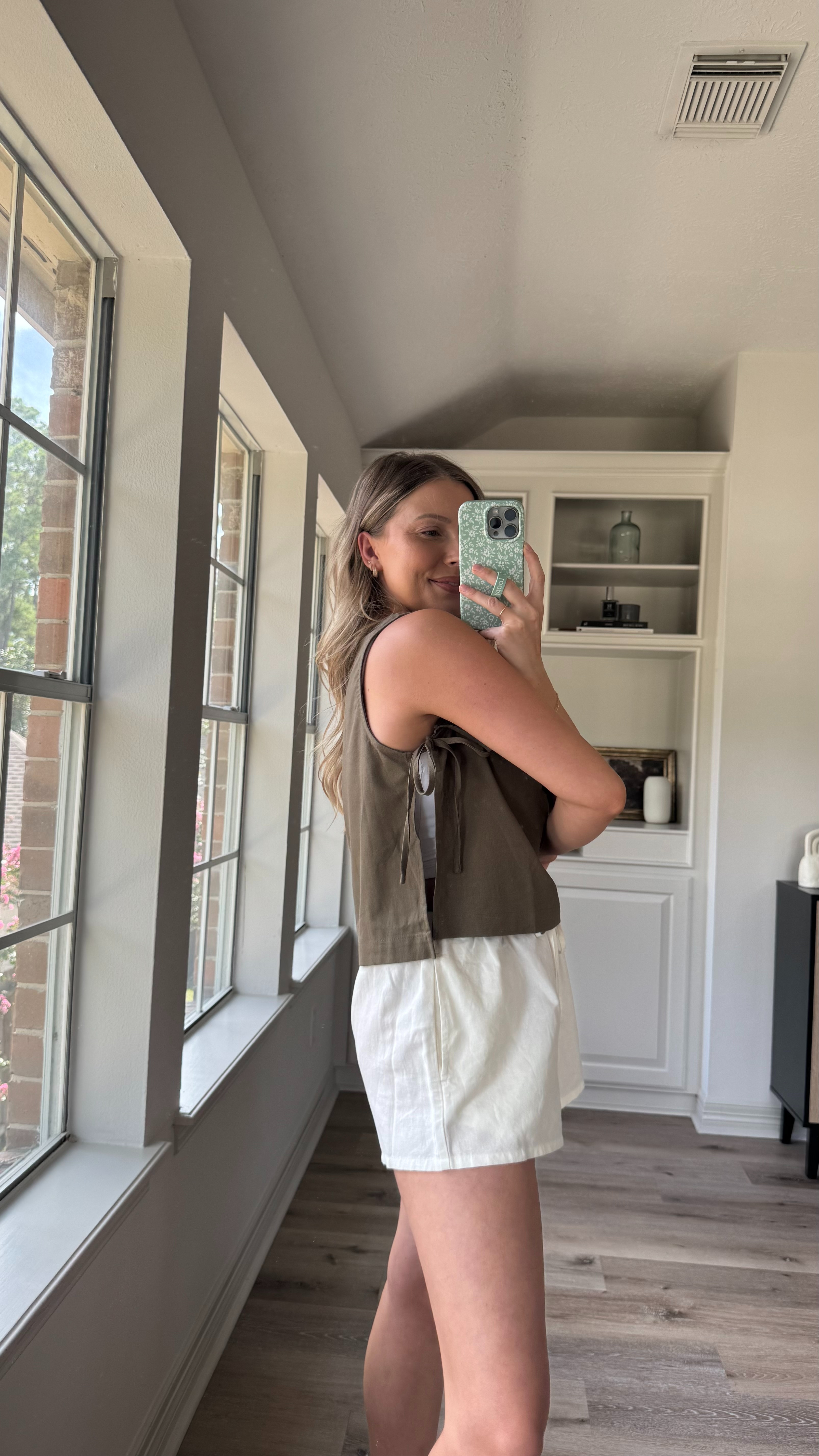 The perfect nursing friendly top for summer! The side slit gives easy access, I just added a sports bra tank under for more coverage. I'm wearing a size S in the top, M in sports bra tank, and M in linen shorts.  

 

#LTKSeasonal #LTKFindsUnder50 #LTKStyleTip