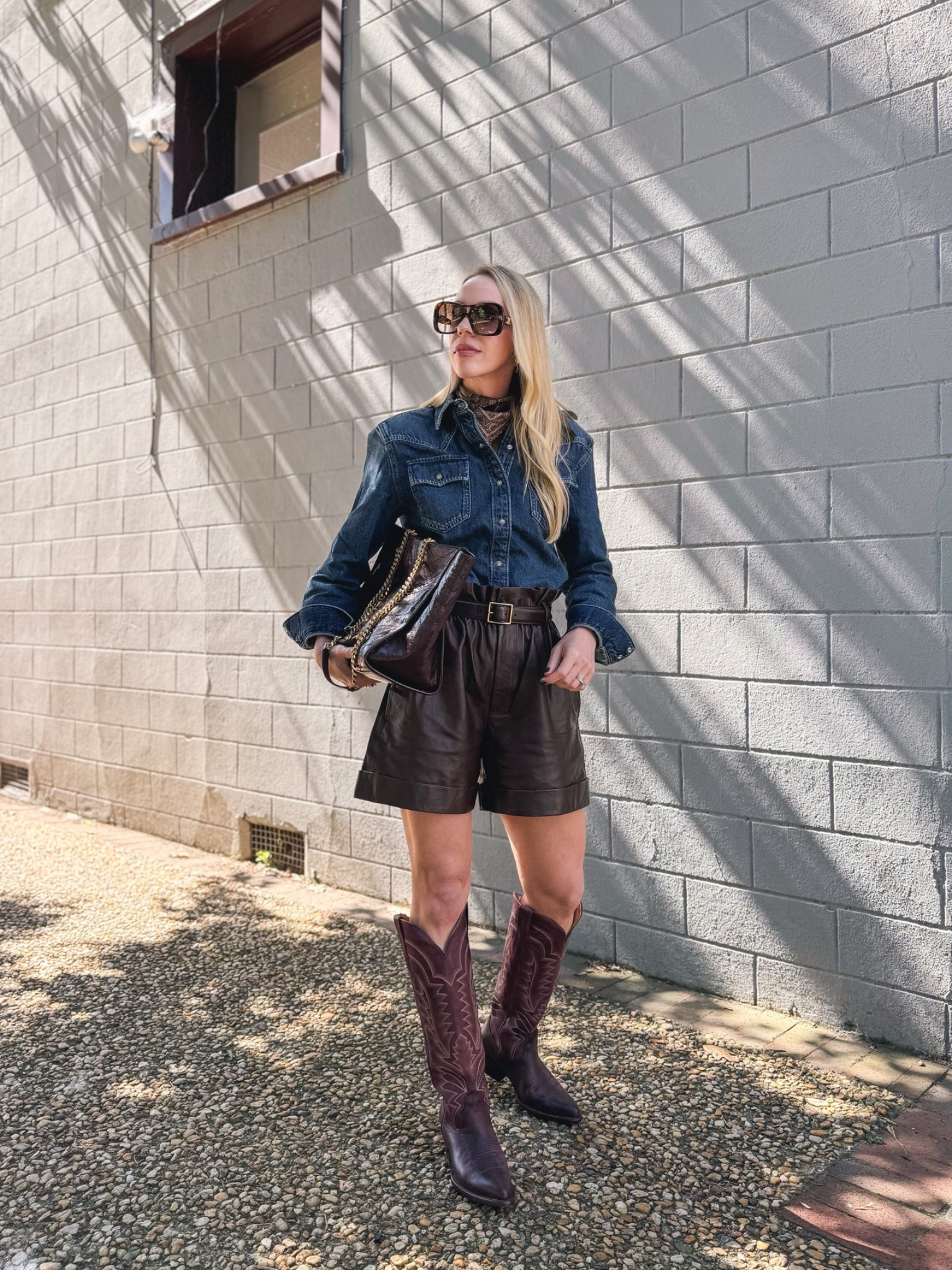 Western style fall outfit with silk paisley scarf, @levi denim shirt, leather shorts, @Tecovas burgundy cowboy boots

#LTKSeasonal #LTKOver40 #LTKSaleAlert