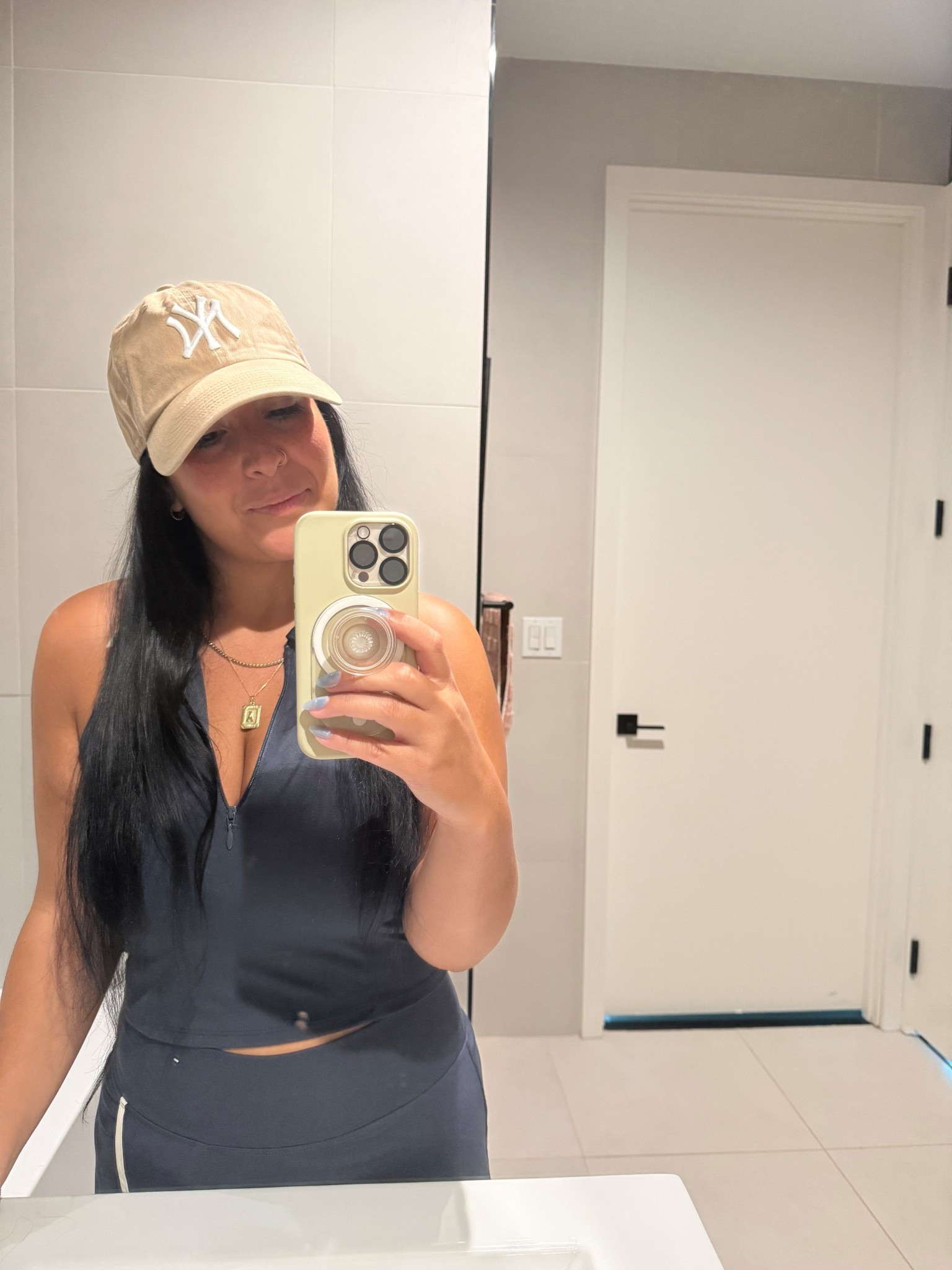 Tried it on. Left it. Thought about it for days. Went back + bought it. No regrets 💙

This Old Navy activewear set has been on repeat lately - easy, flattering, + comfy enough for all-day wear. Paired with my favorite neutral Yankees hat for that classic, sporty look.

Keywords:
old navy activewear, navy workout set, athletic skort outfit, racerback workout top, matching workout set, cute athleisure outfit, Yankees baseball cap, comfy gym outfit, casual sporty look, women’s activewear summer 2025

#LTKMidsize #LTKSaleAlert #LTKActive