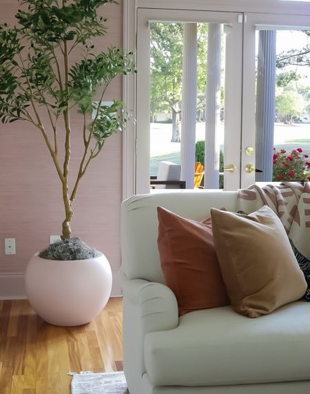 I appreciate a good faux tree. This one is 7’. Paired with a pink pot for an extra pop of whimsy  

#LTKhome #LTKstyletip