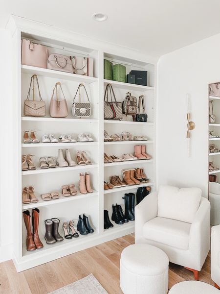 Aesthetic primary bedroom closet with creamy whites, natural wood tones, and gold detail. Loving this new accent chair to bring a cozy and relaxed look to this space 

Home organization, primary bedroom closet, lighting detail, gold detail, accent chair, sherpa chair, area rug, Becki Owens, vintage inspired rug, open shelving, aesthetic closet, shoe organization, Amazon Prime, found it on Amazon, purse hooks, spring refresh, creamy whites, natural wood tone, home aesthetic, shop the look!

#LTKstyletip #LTKhome #LTKSeasonal