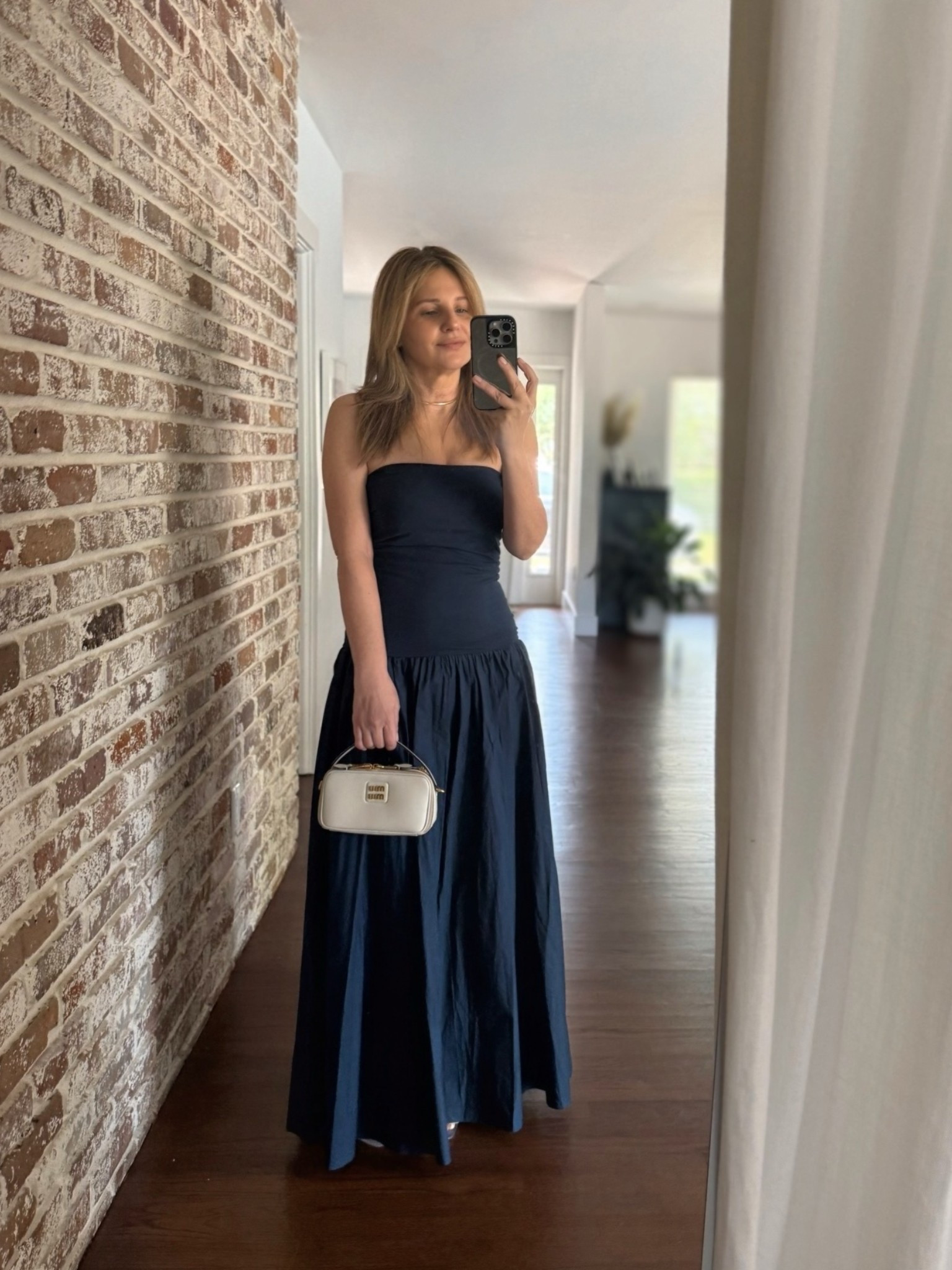 Brunch outfit from last weekend. Wearing a strapless drop waist maxi dress in navy from By Malene Birger. (on point for summer) with my lil Miu Miu top handle bag and a tubular gold collar necklace.

#LTKootd #LTKSeasonal #LTKdayinmylife