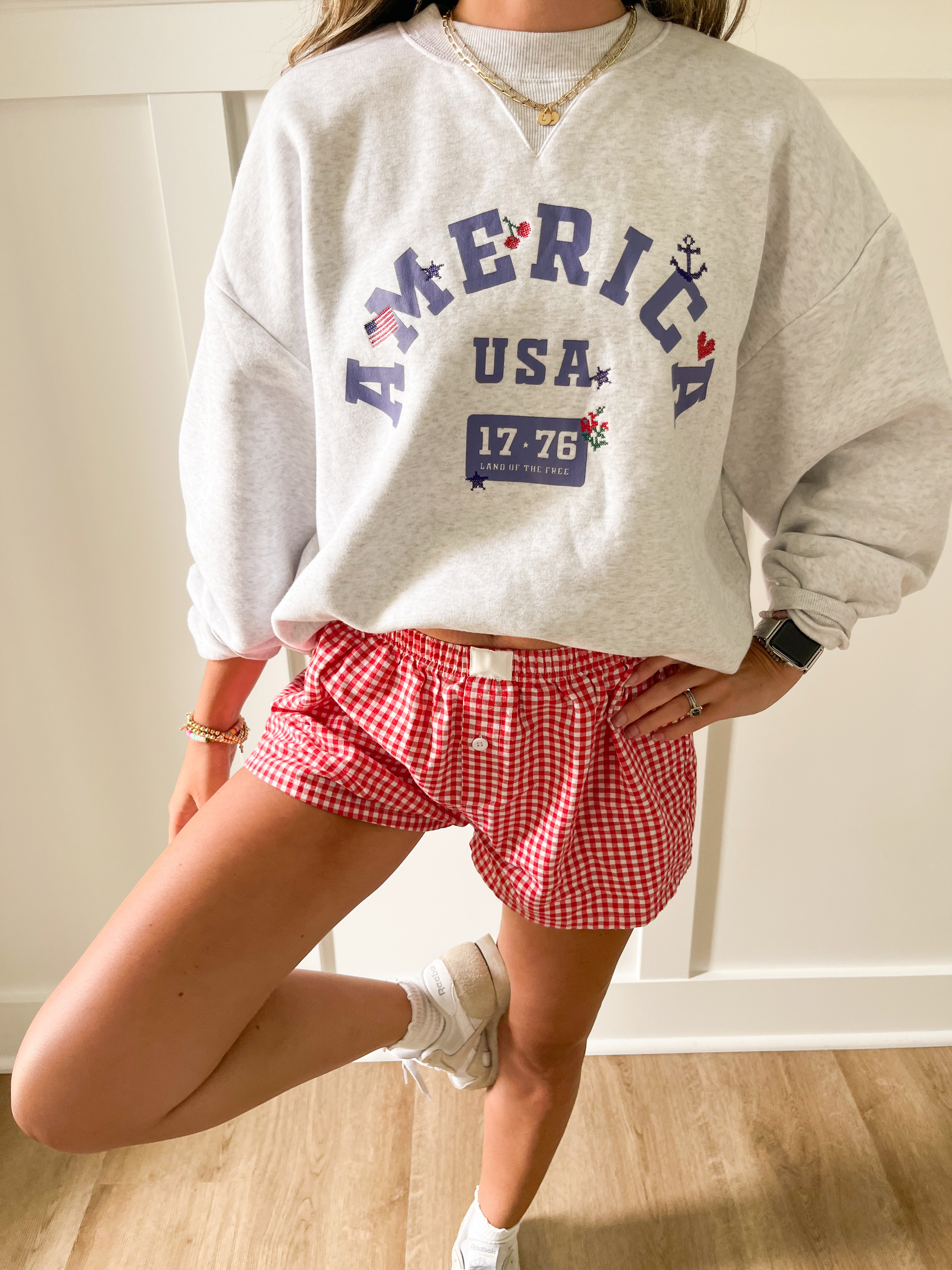 Get ready for July 4th with this Target America sweatshirt and gingham boxer shorts! Pair with white sneakers or a baseball cap and you have a complete patriotic outfit!

Memorial Day outfit, July 4th outfit, fourth of July, american flag shirt, boxer shorts outfit, Americana, gingham shorts outfit, women's amazon fashion, USA, USA tops, American flag sweater, ruffle sneakers, baseball hat outfit, casual summer outfit, bonfire outfit idea, lake outfit, America sweatshirt, target finds, target style

 

 #LTKSeasonal