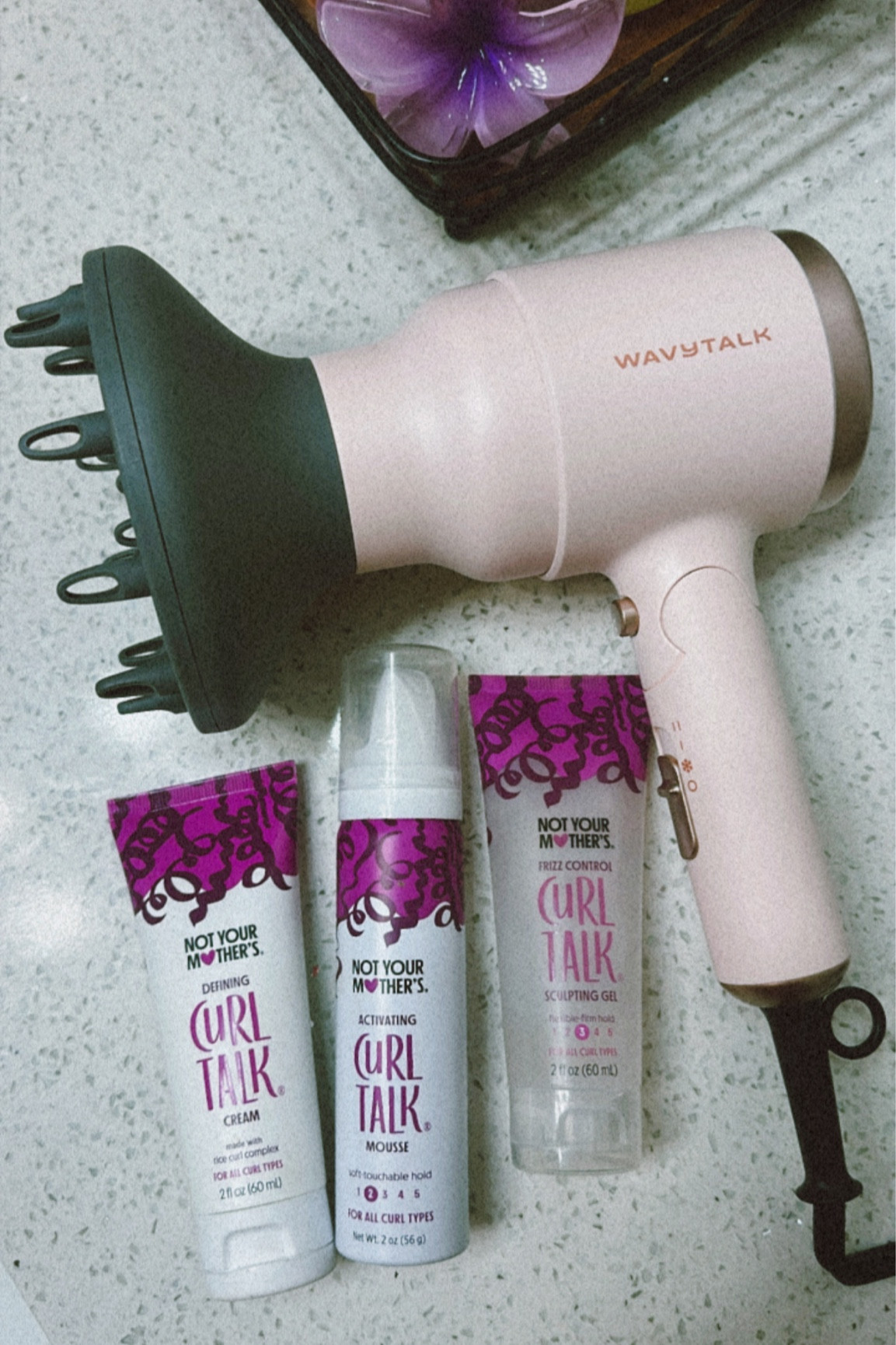 New foldable pink blow dryer with diffuser attachment. Perfect size for traveling. 
Trying out Greta Wilson’s wavy routine with Not your Mothers Curl Talk travel kit. This set is perfect after a beach day on vacation! 🌴🏖️

#LTKswim #LTKbeauty #LTKtravel