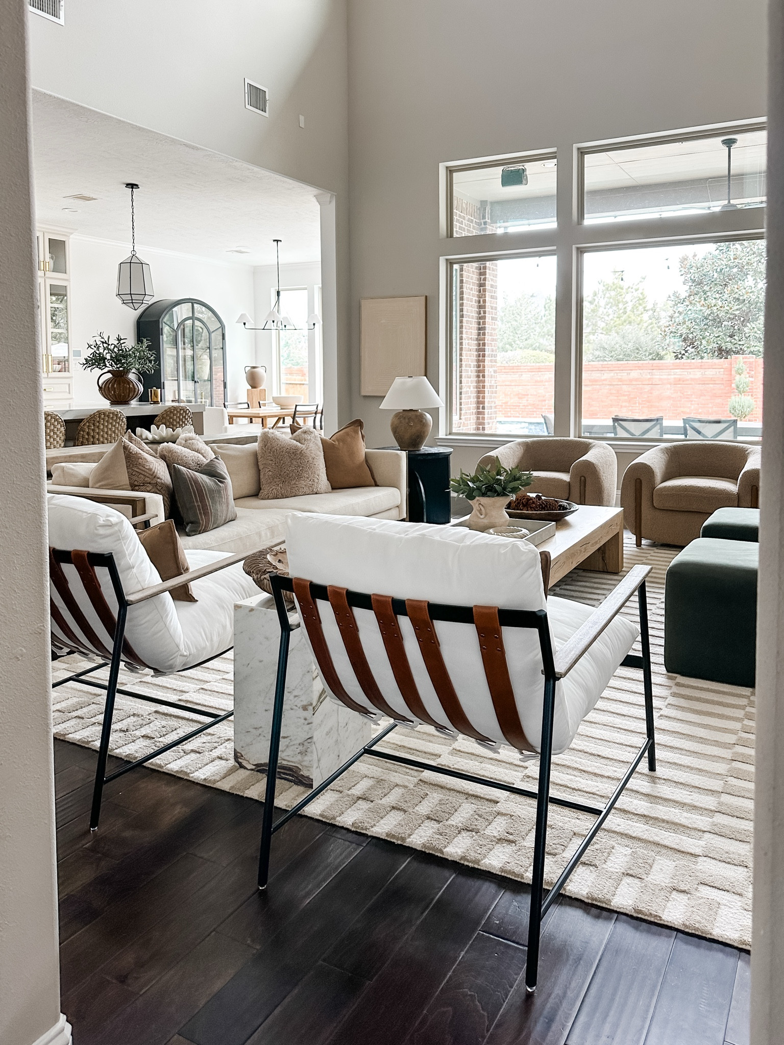 New year, new vibes! ✨ I’ve started refreshing our home with small, simple updates—starting with the living room. I added my Kathy Kuo accent chairs in brown and my leather accents chairs that are my favorite (and super comfortable) 

One more piece is on the way, and I’ve got my eye on a couple more spaces to refresh next. 

Who else loves a little reset to kick off the year?

#LTKHome #LTKSeasonal #LTKStyleTip