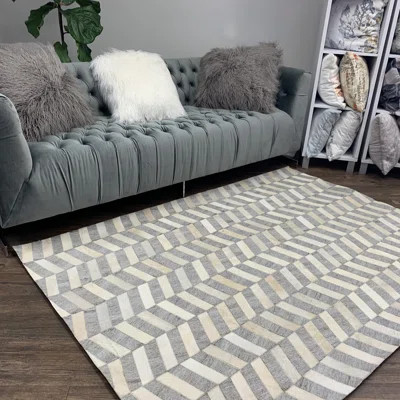 Real Leather Patchwork Cowhide Viscose Chevron Area Rug | Wayfair North America