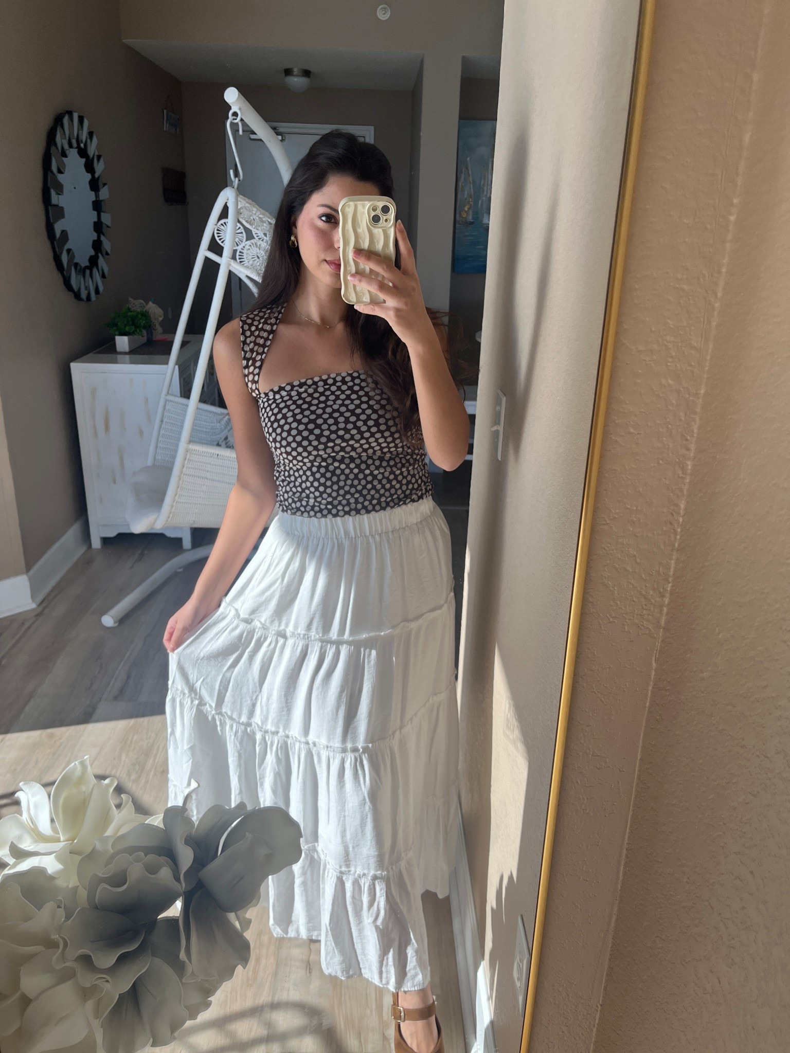 Currently vacationing in Panama City Beach on the drive up to see family in NC🍂 We were about to head out to Alys Beach for an evening around town so I took this quick photo before we left! I am in love with this brown and white polka dot top from Abercrombie! 🤎🤍

#LTKStyleTip #LTKTravel #LTKSeasonal