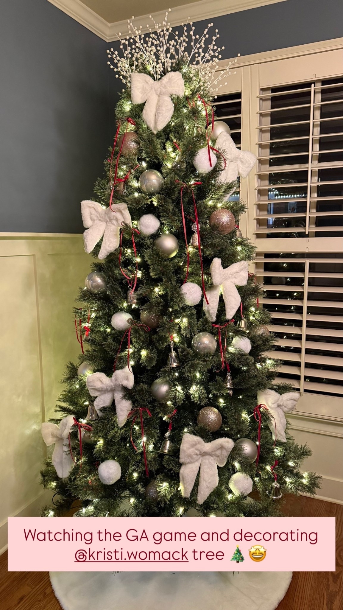 Watching the GA game and decorating @kristi.womack tree 🎄🤩