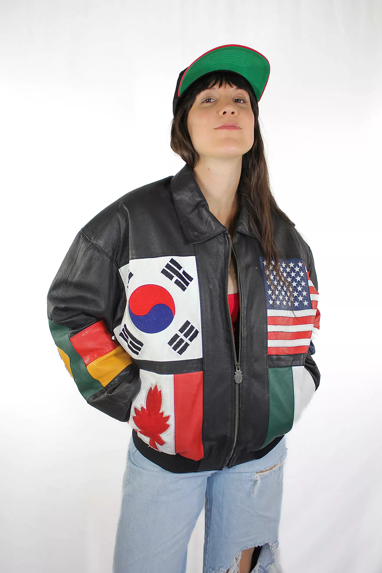 1980s Vintage Phase3 World Flag Winter Olympics Leather Bomber Jacket Selected By Moons + Junes V... | Free People (Global - UK&FR Excluded)