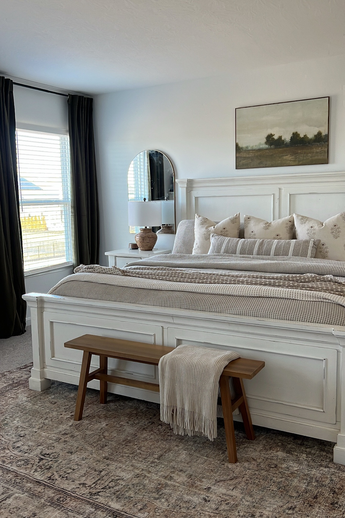 My bedside table lamps are on sale! 🤩 

Primary bedroom, wooden bench, arch mirrors, velvet curtains, wall art, throw blankets 