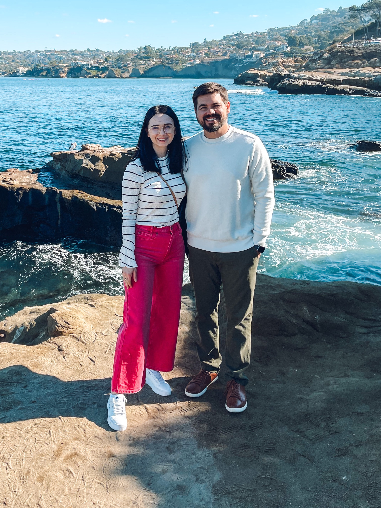 Perfect travel day outfits. I grabbed these sneakers while in San Diego and they are sooo comfy! 10/10 recommend and they are under $50! My husband loves these leather sneakers and wears them constantly. He says they are super comfy too! 

Travel outfit, urban outfitters, target style, men’s style, men’s travel outfit, men’s shoes, wide leg denim, Roxy, sneakers, San Diego, winter style 

#LTKtravel #LTKmens #LTKstyletip