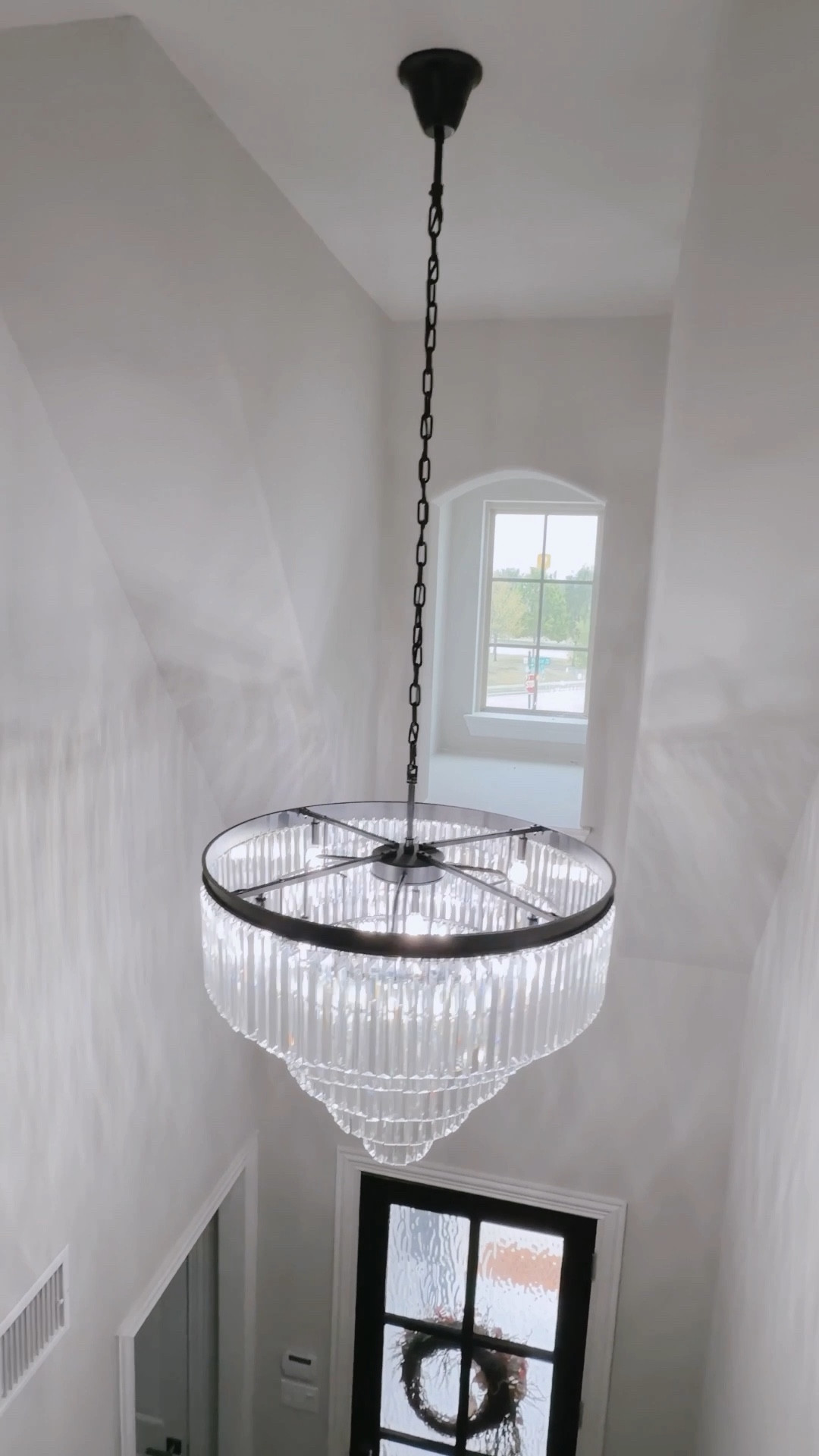 Entryway chandelier ✨ We hung every crystal ourselves (yes, every single one!) and had a friend install it. It’s a beast but the most stunning statement piece for an entryway. PS: it’s on sale! :) 

#LTKHome #LTKSaleAlert