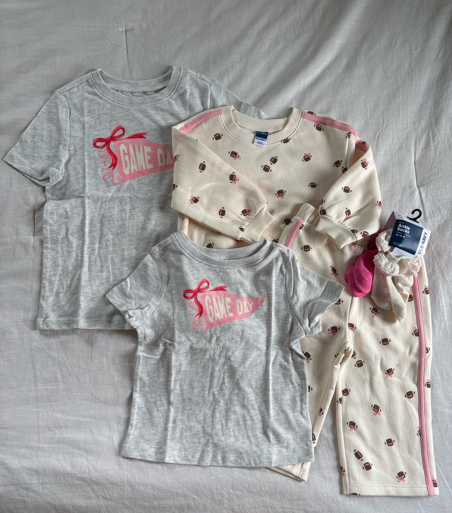 Football set - - BACK IN STOCK! 

Couldn’t pass up the most adorable game day gear. I love to match the girls, so it was they came in toddler 

and baby sizes.

#LTKBaby #LTKKids #LTKSeasonal