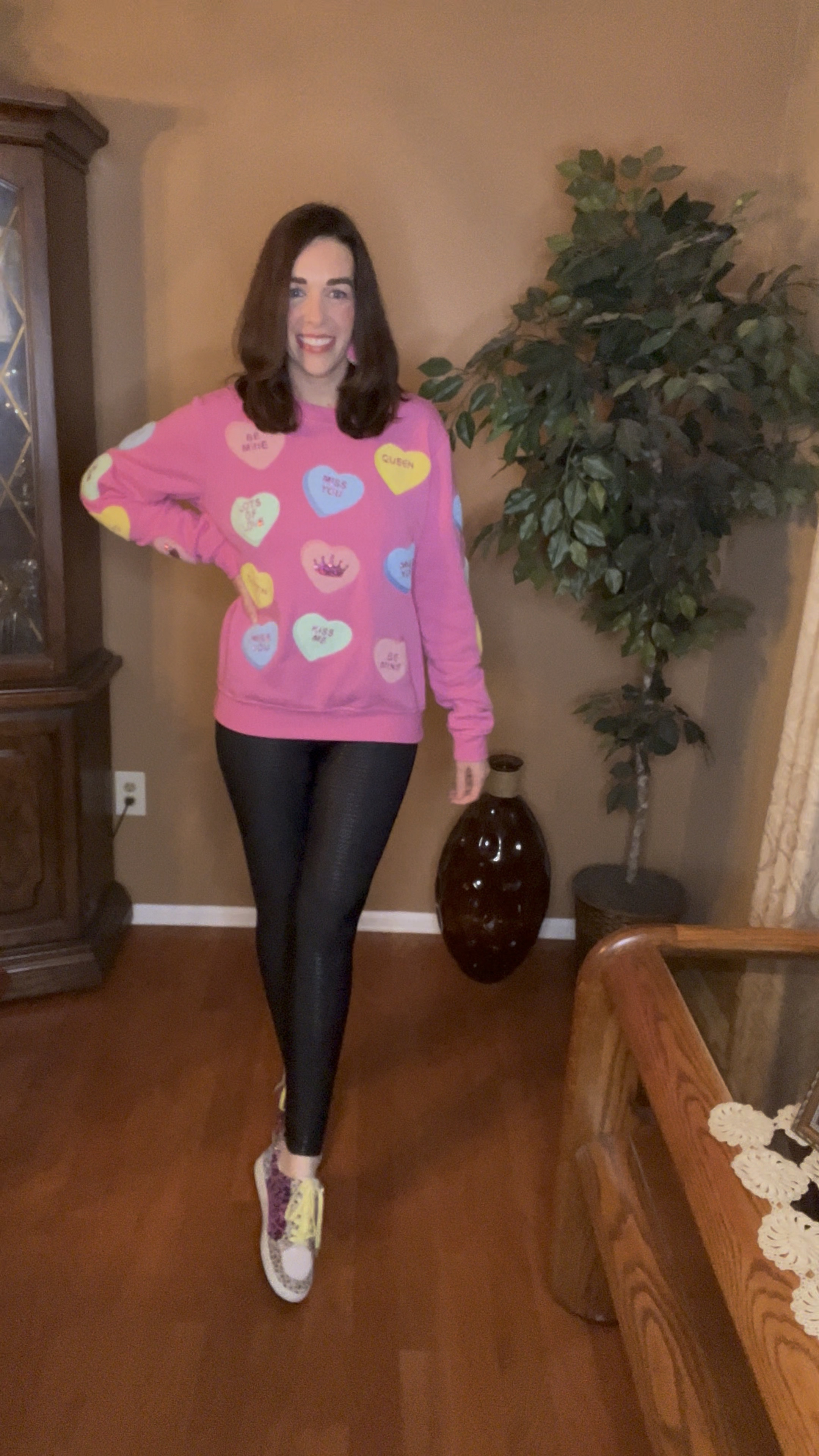 Candy conversation hearts pink sweatshirt (small). Black faux leather leggings (small). Multicolor sneakers (8.5). #sweatshirt #sweatshirts #pinksweatshirt #candyhearts #candyheartssweatshirt #leggings #blackleggings #fauxleatherleggings #whiteboots #boots #winteroutfit #valentinesdayoutfit
Valentine’s Day Outfit 