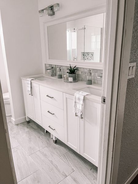 Bathroom vanity, vanity styling, bathroom decor, amazon decor, amazon bathroom finds

#LTKhome #LTKstyletip #LTKFind