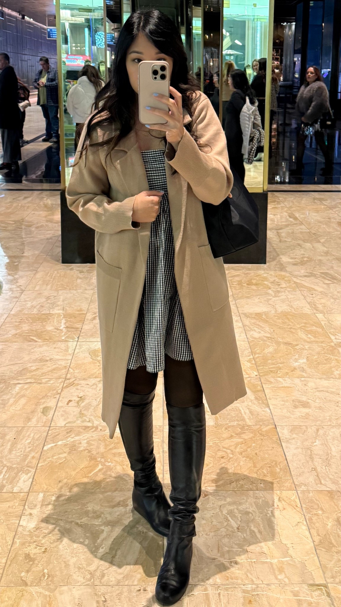 Perfect outfit for feeling warm and cute in cold weather! Wearing XSP in the dress. My boots are old from Stuart Whitman but I linked similar!

#LTKTravel #LTKFindsUnder50 #LTKPetite