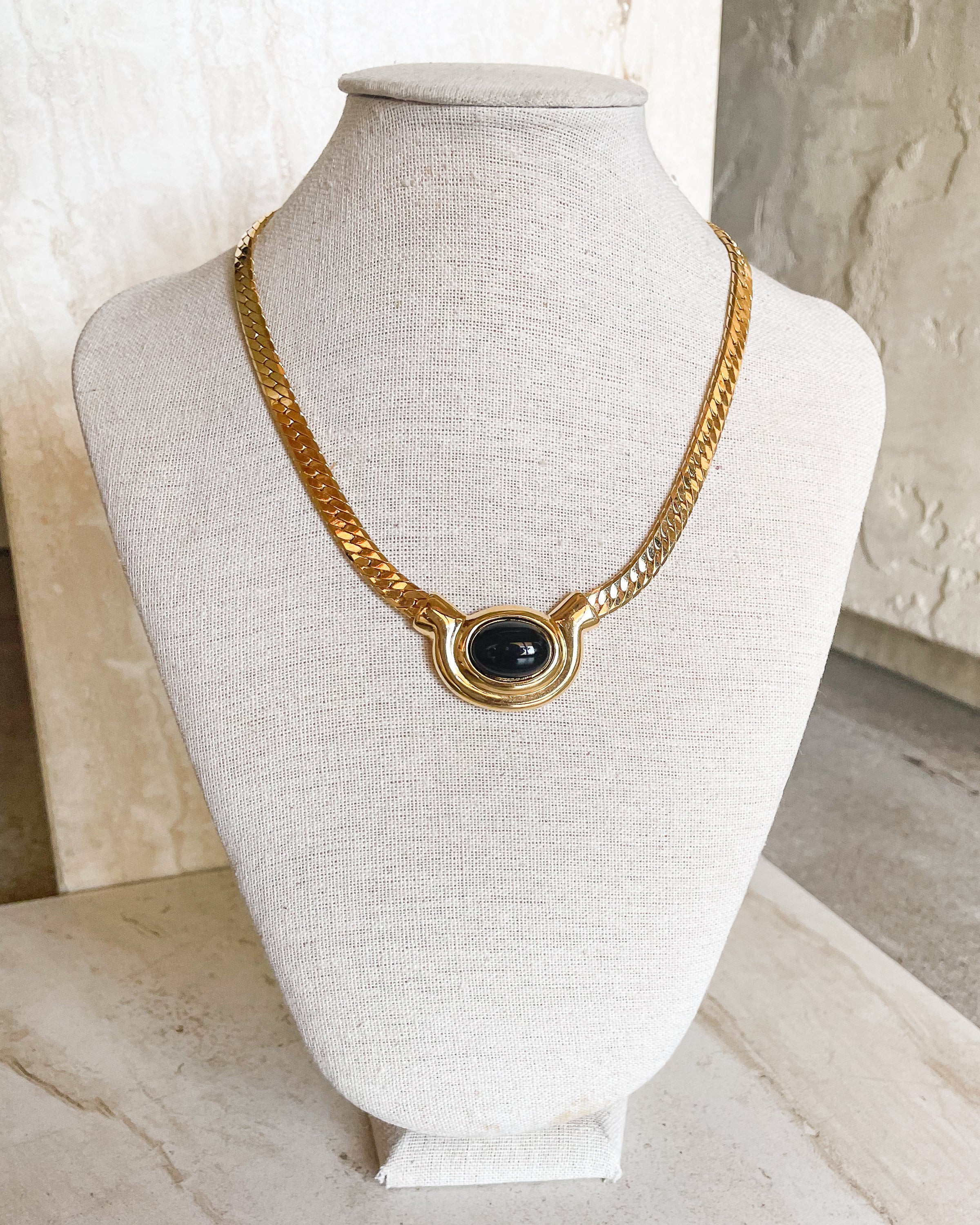 Vintage Signed Gold and Black Oval Stone Herringbone Necklace | Care Tucker