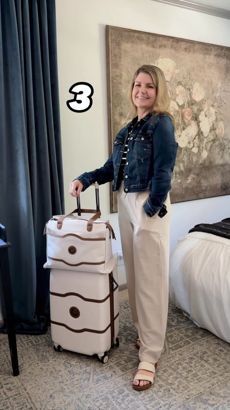 ✨ CARRY-ON ONLY TRAVEL CAPSULE IDEAS
Everything I’m packing for a 12 day summer trip to Europe with 15 clothing pieces on 

I tried on 12 outfits here, but you can make MANY more outfits than this using these pieces! (Save this reel for your next trip 🧳)

We’re traveling to Stockholm to finally see some of my family after many years of waiting. And we’re visiting London and Paris for a few days between as ✈️ layovers while we’re there. 

Packing List Below 👇 

Tops:
White button-down
Blue stripe button-down
Black stripe pullover 
White henley 
White tube top 

Bottoms:
Dark wash jeans
Khaki linen look pants 
Navy wide leg pants 
Light blue wide leg pants 
Olive maxi skirt 

Layers:
Denim jacket
White blazer 
Trench raincoat 

Shoes:
White leather sneakers 
Brown sandals 
Canvas flats 

Accessories:
Crossbody bag
Sun hat 

(I’m tossing in 2 tees & 2 leggings for pjs and of course undies as well.)

TIP: tightly roll each clothing piece and use compression bags to maximize suitcase space. 

All of this fits in my carry-on sized suitcase with toiletries in my personal item tote to fit under the seat. 

#walmartfashion #travelcapsule #capsulewardrobe #carryononly #packinglight #europetravel #minimalistpacking #packwithme #carryonluggage #packinglist #travelessentials 



#LTKVideo #LTKtravel