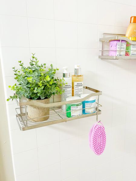 My recent favorite Amazon purchase! These stuck to wall shower caddy’s are such an upgrade to the traditional over the shower hook! They stick to the wall and hold lots of weight. The plant also adds a nice pop of color to my bathroom. Also linking my favorite everyday beauty and soap shower products 

#LTKunder50 #LTKhome #LTKSale