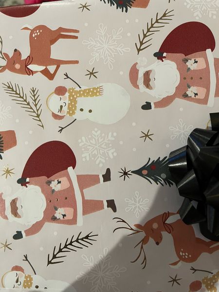 The cutest wrapping paper - I love when I see Santa’s with brown skin 🎅🏽🎅🏾🎅🏿 Thank you Target! 

#LTKHoliday #LTKSeasonal #LTKGiftGuide