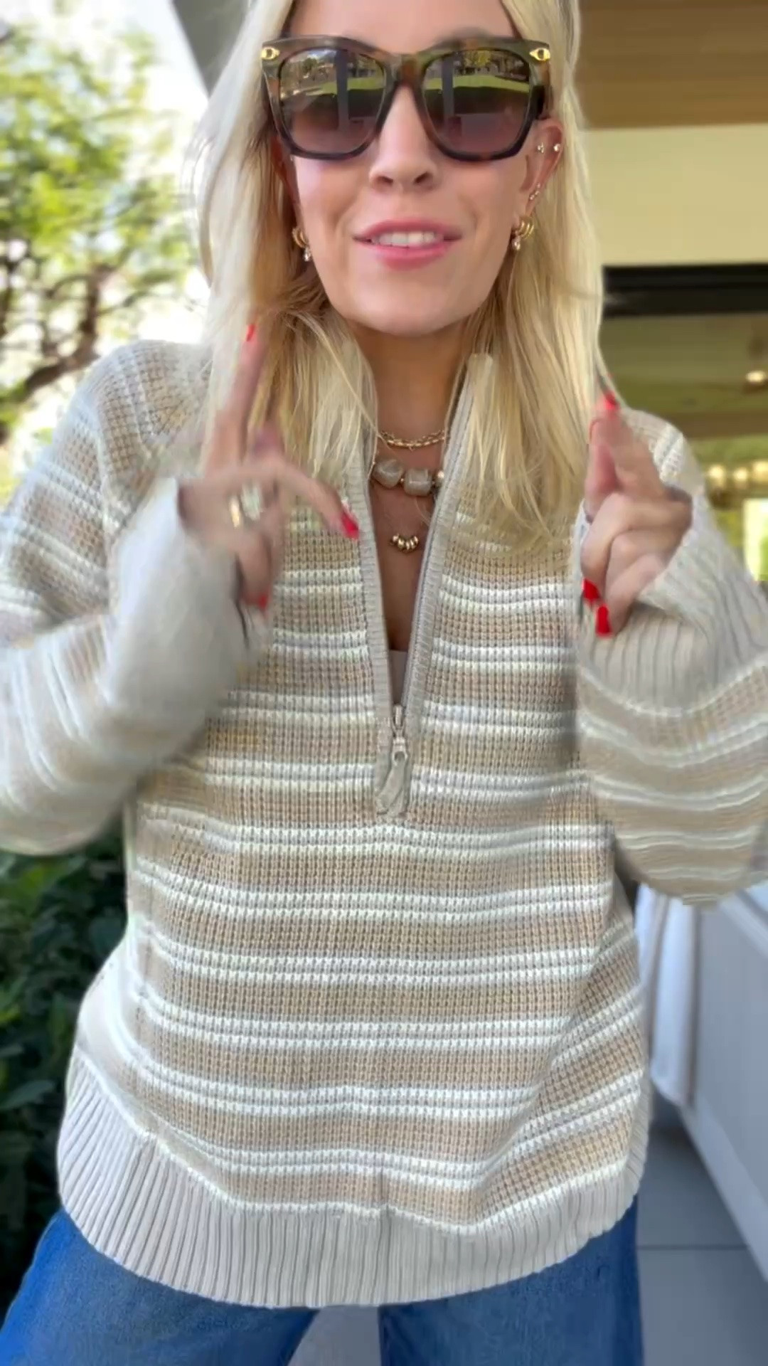 Zip up that is the perfect weight for going into fall! I love the neutral stripe! I did size medium!