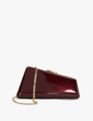 Balancing asymmetric patent faux-leather clutch | Selfridges