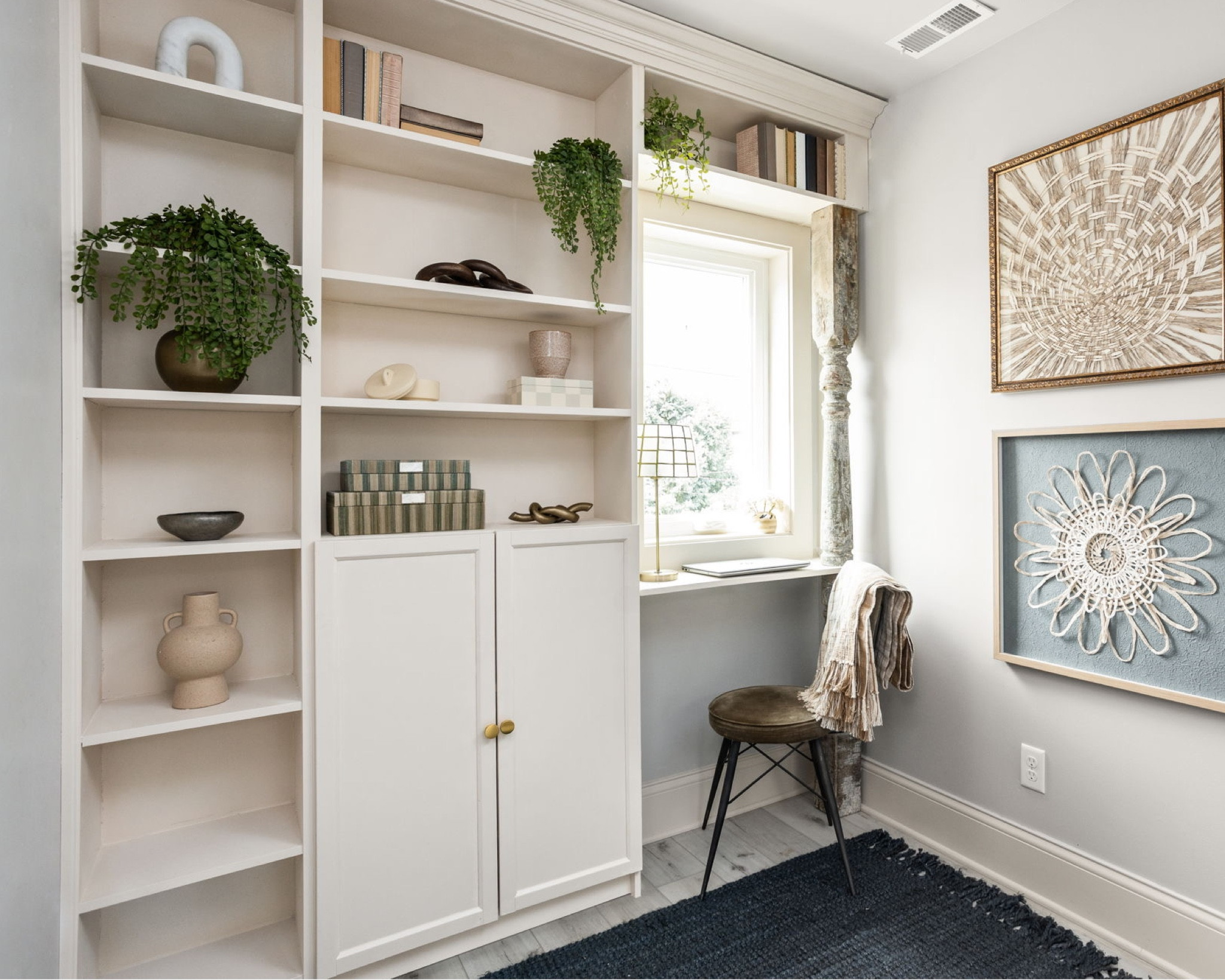 We used pre-fabricated bookshelves to create a built-in look in the loft.

#LTKhome