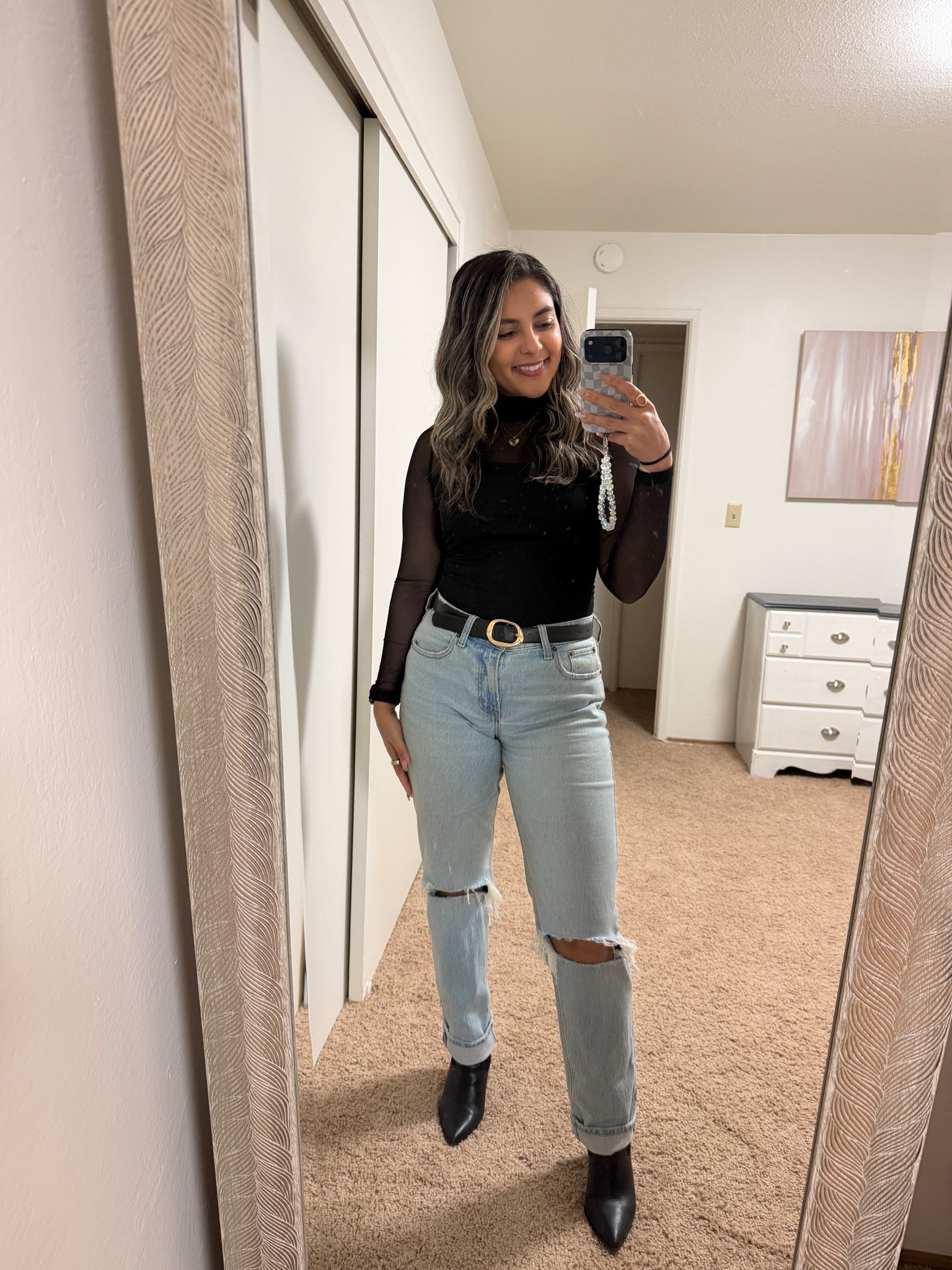 Classic everyday outfit featuring a black sheer long sleeve top, light wash ripped jeans, and black ankle boots 🤍
An easy casual look that works for date night, drinks, or everyday wear.

#everydayoutfit #casualchic #jeansoutfit #blacktopoutfit #ankleboots #ltkfashion #ltkstyle #ltkunder100 #wardrobebasics