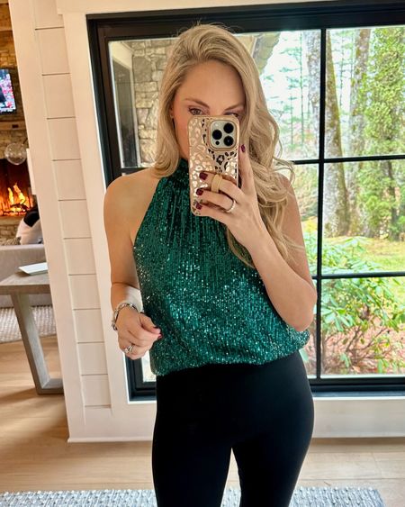 Cute and easy holiday outfit with this sequin halter top! Wearing a size small 

#LTKHoliday #LTKstyletip #LTKover40