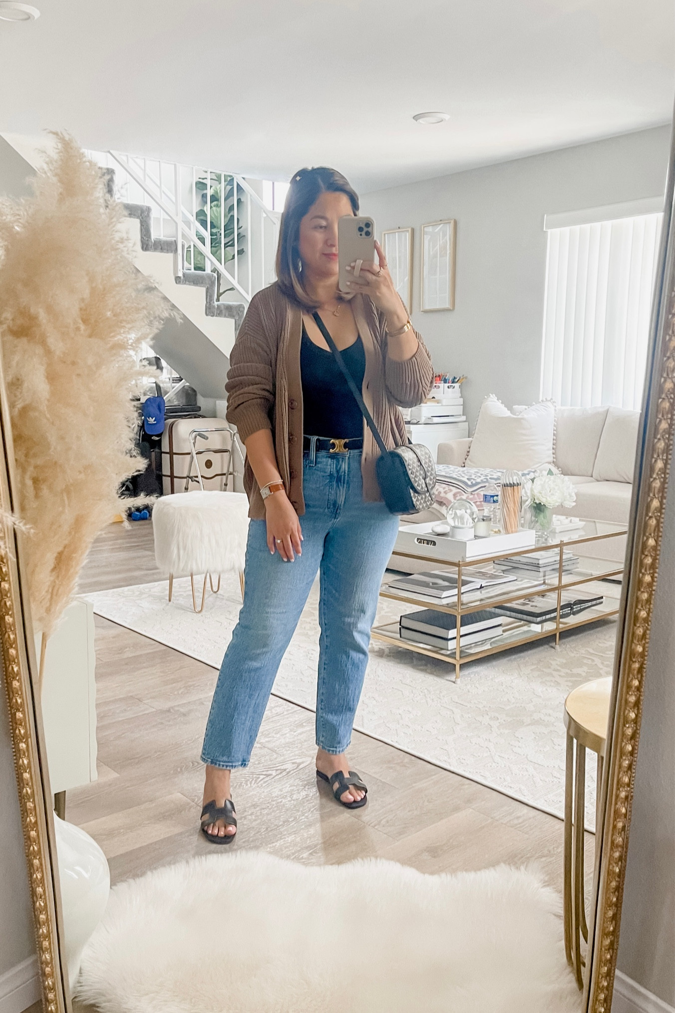 Jenni Kayne cotton cocoon cardigan in medium 

black ribbed tank in medium 

madewell vintage jeans

Longines dolce vita watch

#LTKstyletip