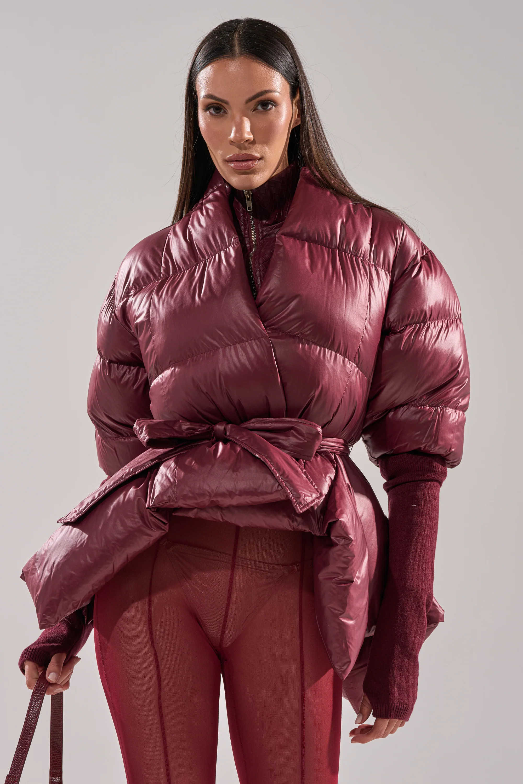 RIB SLEEVE PEPLUM PUFFER IN BURGUNDY | AKIRA