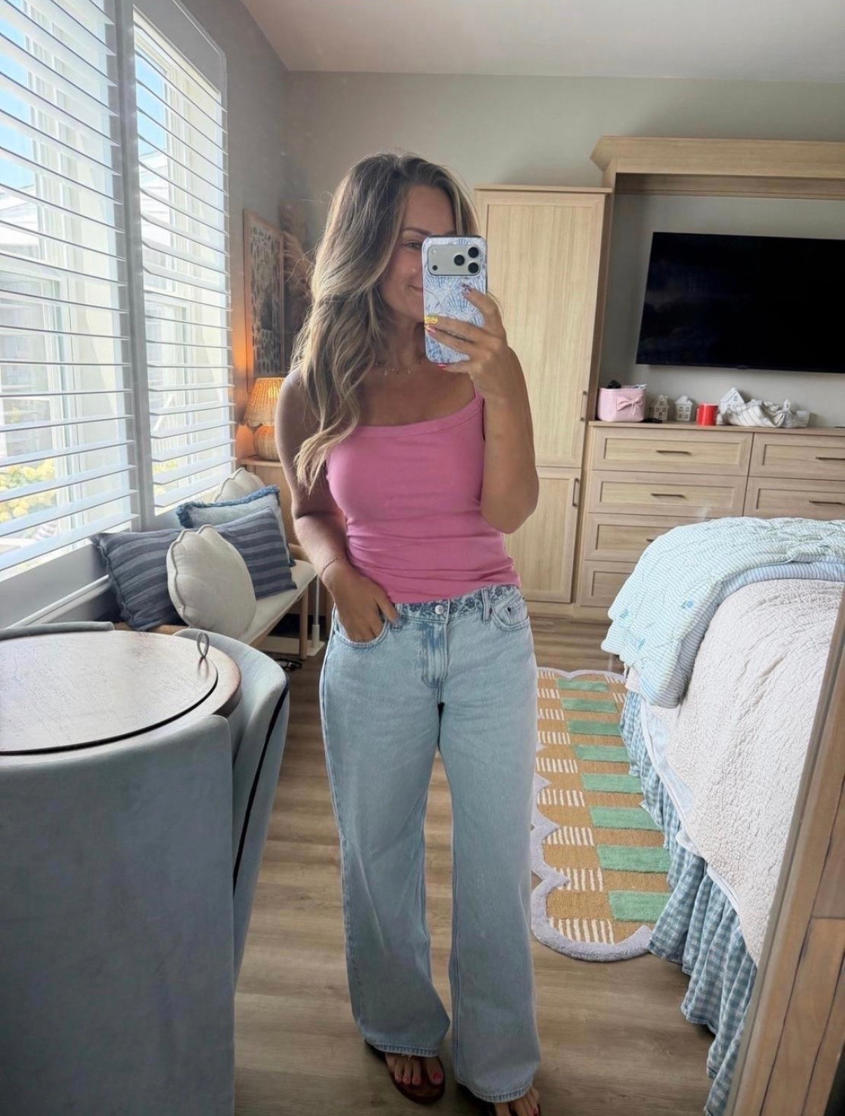 The outfit that’s making expensive denim a little nervous. 👀💗

This pink tank is such a good staple (soft, flattering, and under $20 🙌), and these jeans have that relaxed, effortless fit that’s everywhere right now. Added my favorite sandals and simple jewelry for an easy everyday summer outfit.

summer outfit, casual outfit, petite fashion, wide leg jeans, light wash jeans, pink tank top, Amazon fashion, everyday style, affordable fashion, neutral outfit, weekend outfit, vacation outfit, coastal style, capsule wardrobe

#LTKgrwm #LTKootd #LTKSeasonal