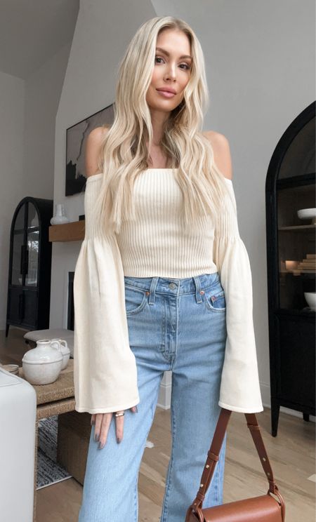 Off the shoulder sweater flare jeans spring clothing revolve sexy