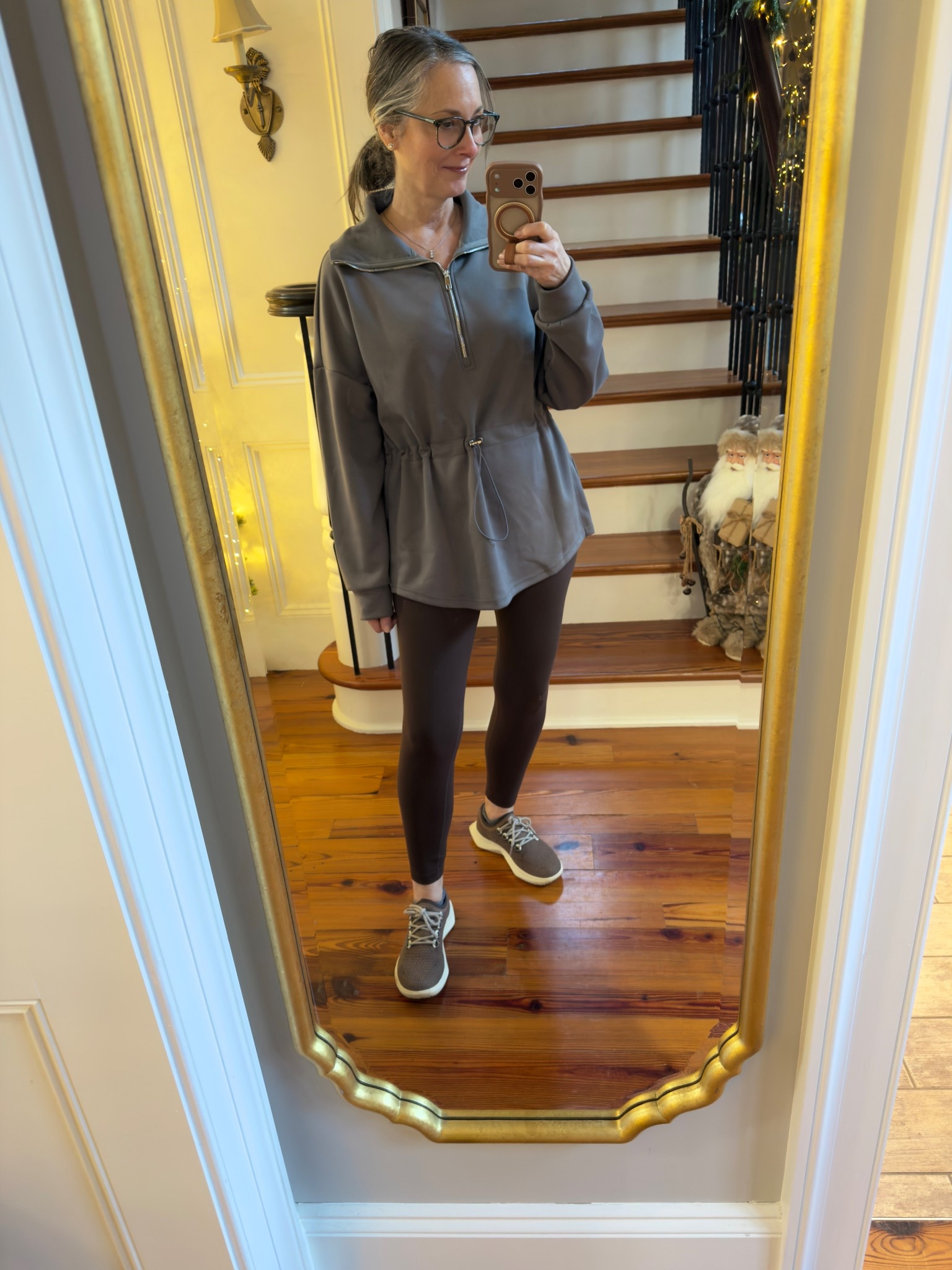 Cozy look for Christmas decorating! The Amazon leggings in brown are so soft and are a great length. Love that they don’t bunch at the legs. The zip front pullover is a bit dressier. It covers your bum in leggings. I sized up 1/2 a size in my Allbirds. 
Leggings and sweatshirt are both a medium. Could have worn a small in the sweatshirt, but I prefer the roomier fit. 

#LTKootd #LTKActive #LTKOver40