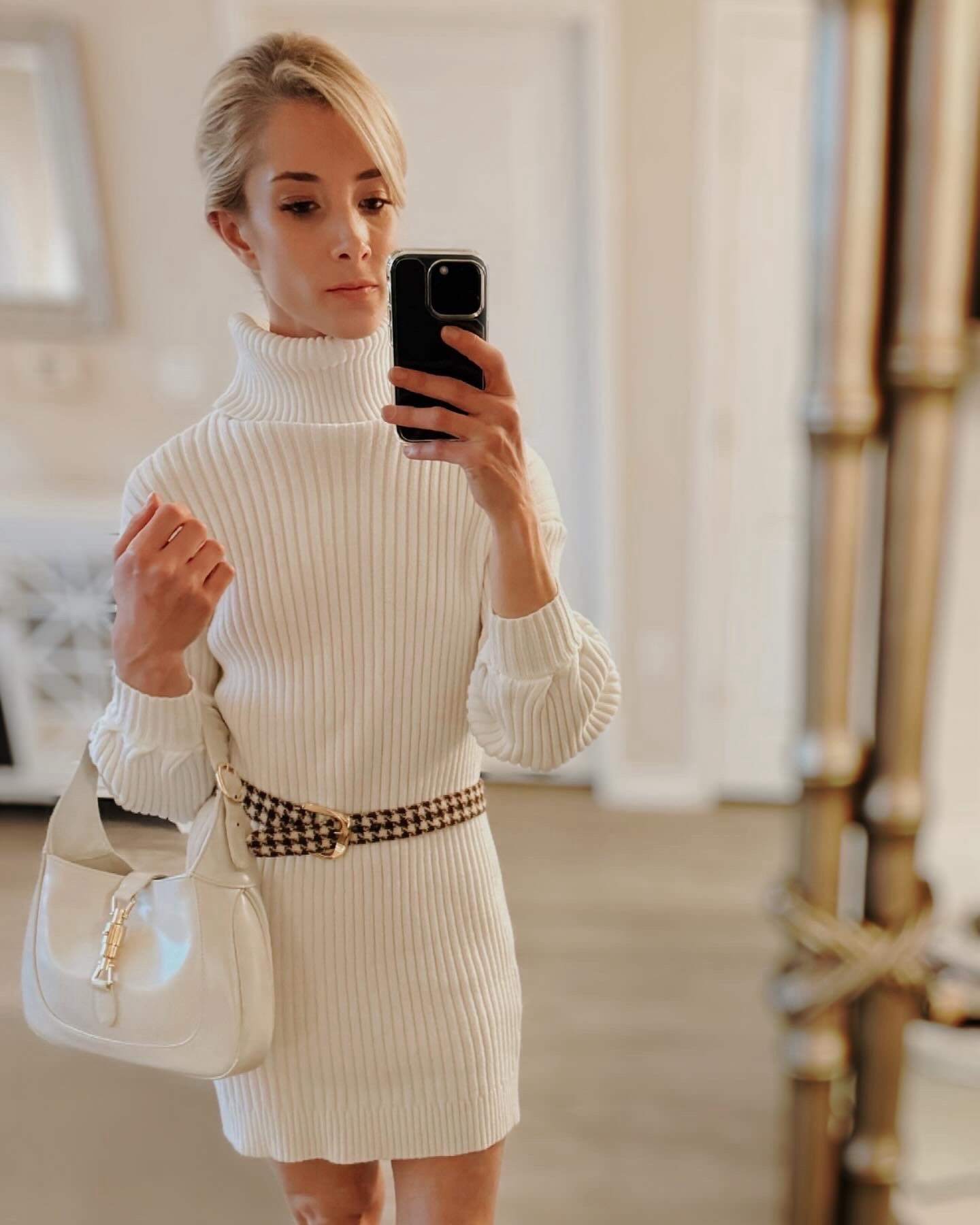 Wrapped up in warmth with a loose fit sweater dress, vintage belt, off-white handbag, and brown booties. 🤗 Loose knits, vintage vibes, and a dash of neutral goodness: Ready to conquer winter in style! ❄️🩵

Visit my Amazon Store to shop the look!
#sweaterdress #winteroutfit #winterwhite #winterfashion 

#LTKworkwear #LTKstyletip #LTKSeasonal