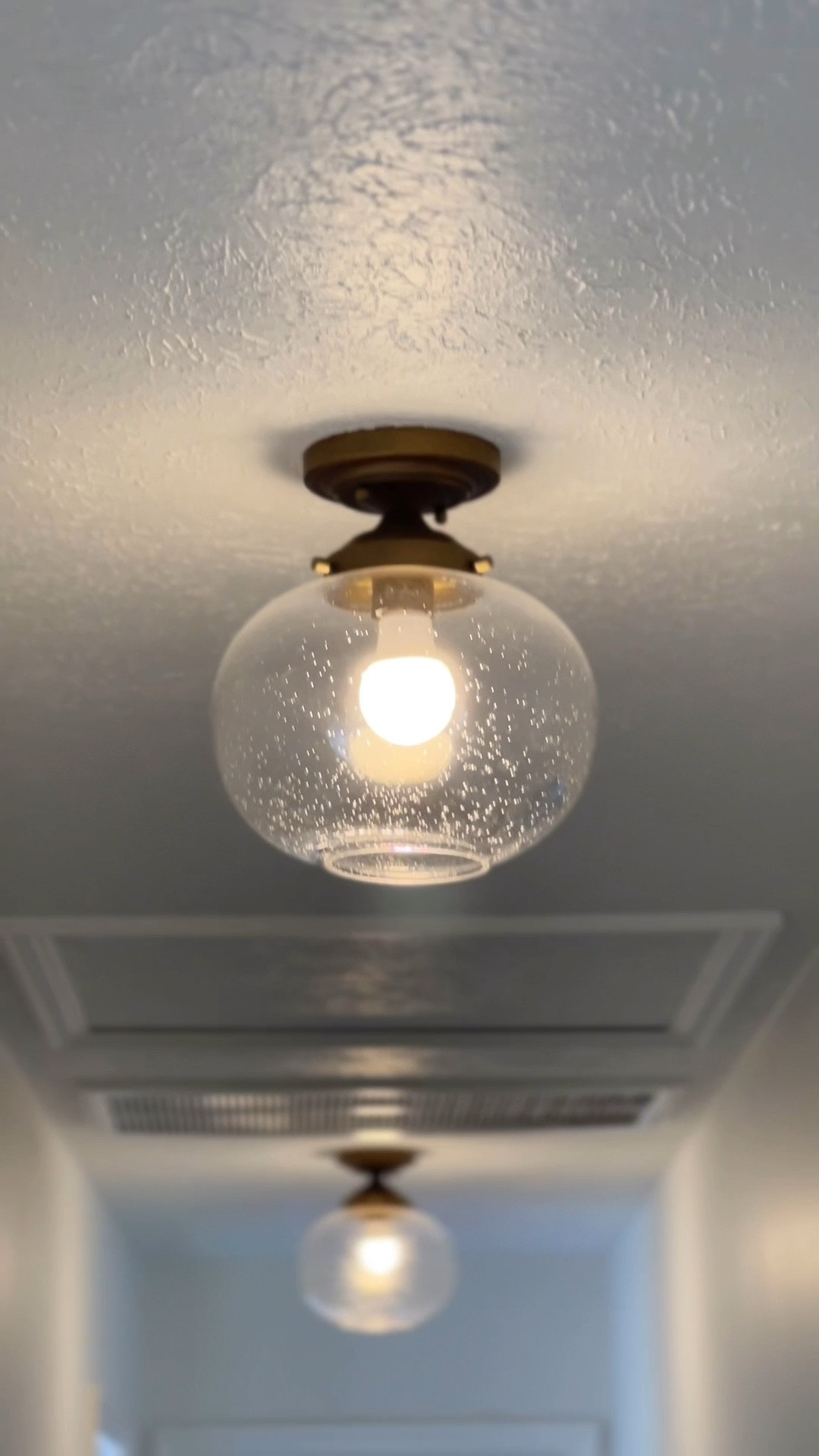 Found the prettiest (and affordable!) semi flushmount light fixture — installed three in this extra long hallway. Elegant yet cozy — these lights elevate any space, be it hallway, closet, bedroom, bathroom, kitchen and more! 

#LTKHome #LTKSaleAlert