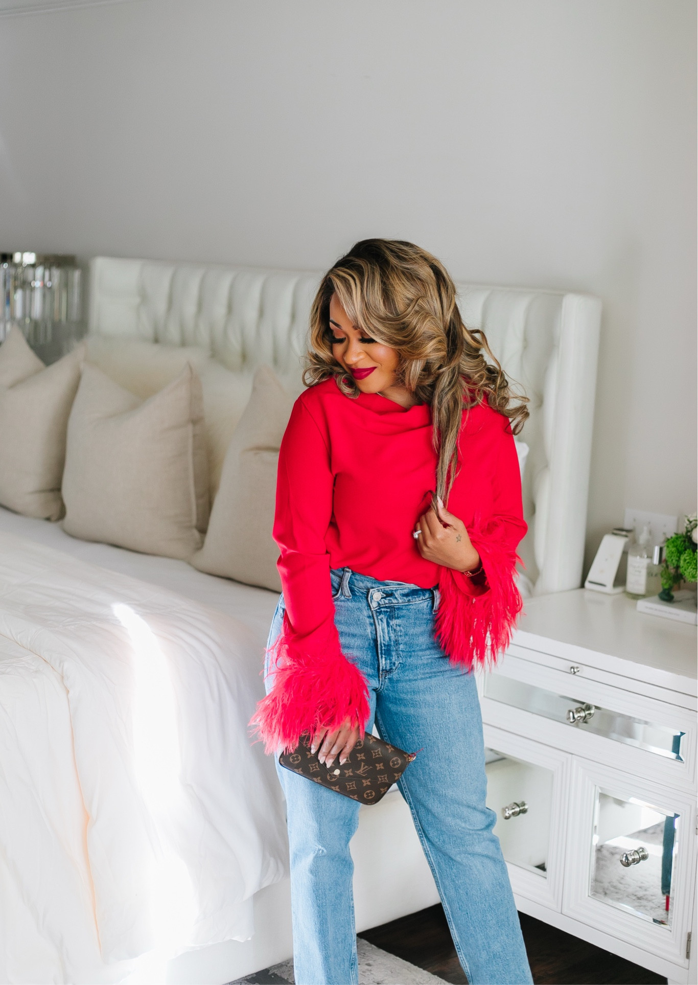 This red top is everything—sheer, chic, and those feathered cuffs? A total statement! ❤️ Perfectly paired with jeans and bold red heels for a casual yet sexy Valentine’s Day vibe. This look has all the glam without overdoing it!

valentine outfit // chic style // red and denim // effortless glam // date night look // feather top // casual chic // valentine’s day fashion // statement top // trendy outfits