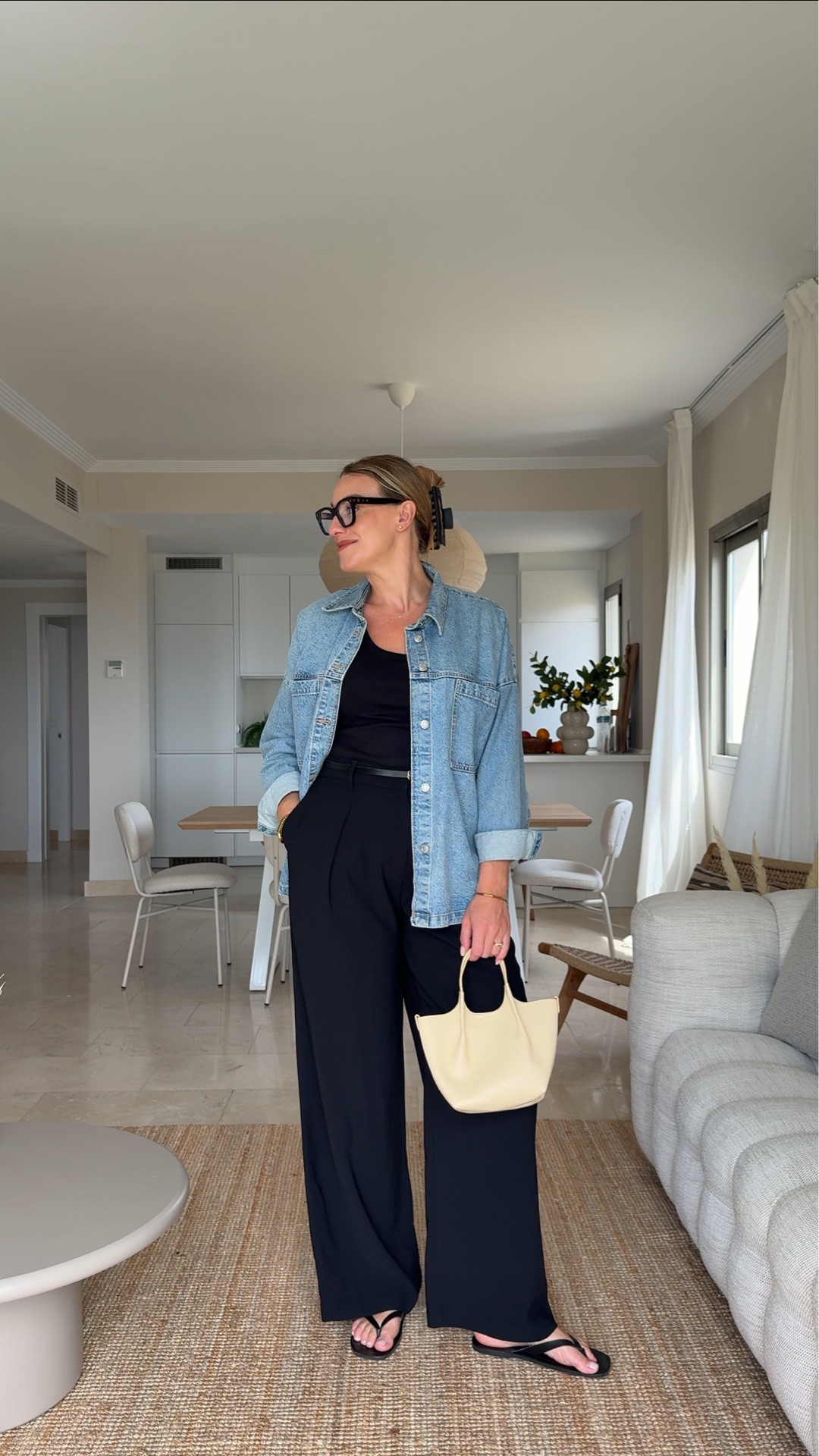 Day two of 30 spring outfits mid-size friendly , black white leg trousers, black Cami vest top denim jacket/denim shacket , lemon leather mini handbag, Gillian Anderson M&S collection, black leather sandals, black Louis Vuitton blue light glasses, black claw clip


#LTKspring #LTKmidsize #LTKeurope