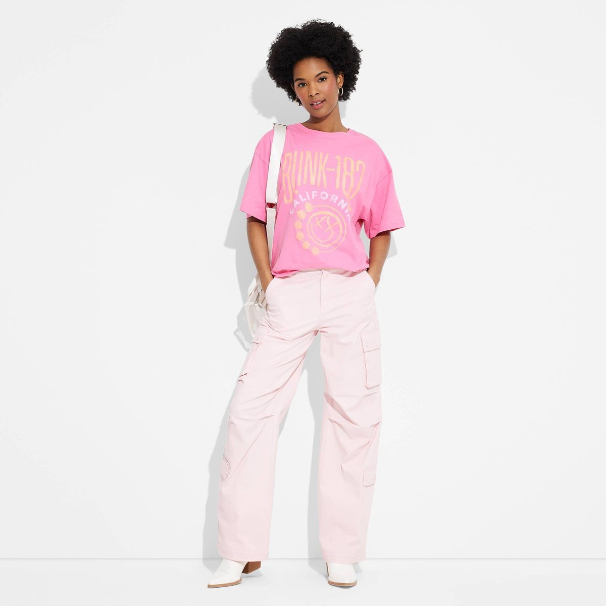 Women's Blink 182 Oversized Short Sleeve Graphic T-Shirt - Pink | Target