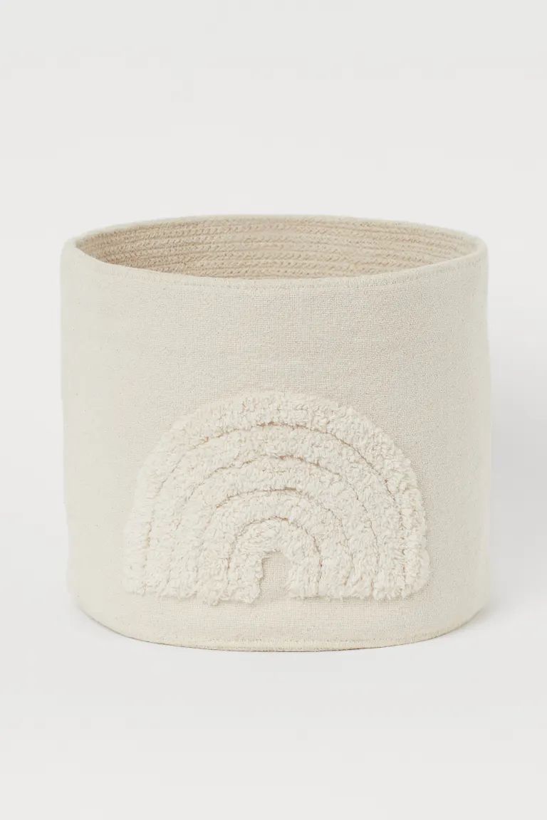 Storage basket in unbleached woven cotton fabric with a tufted, tone-on-tone rainbow design. Heig... | H&M (US + CA)
