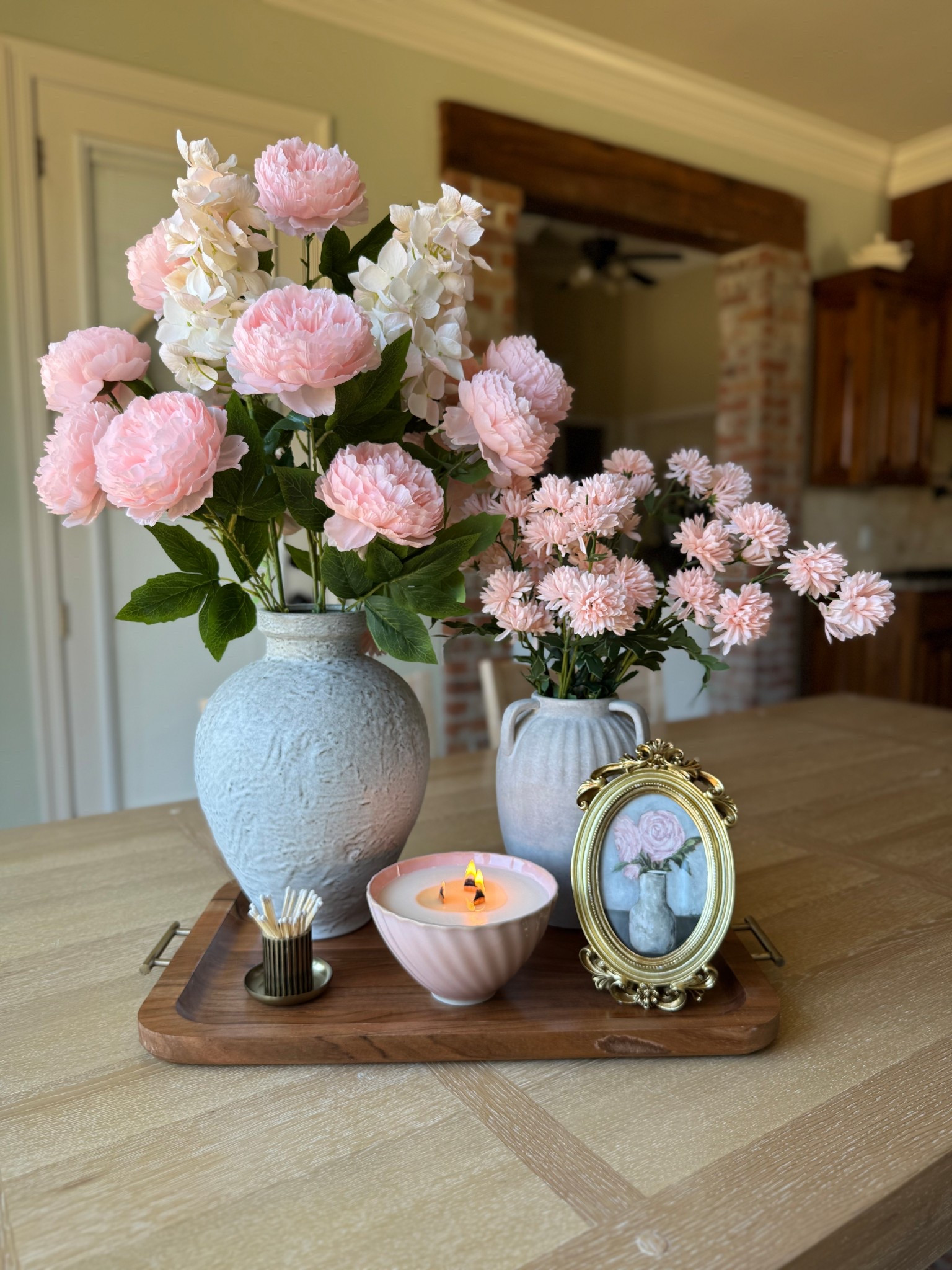 Spring centerpiece idea. Light pinks and some gold touches make for a lovely, elegant spring look. 

#LTKHome