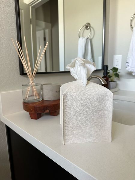 Simple bathroom decor with a tissue box cover, wood riser, and faux plant  

#LTKStyleTip #LTKHome #LTKFindsUnder50