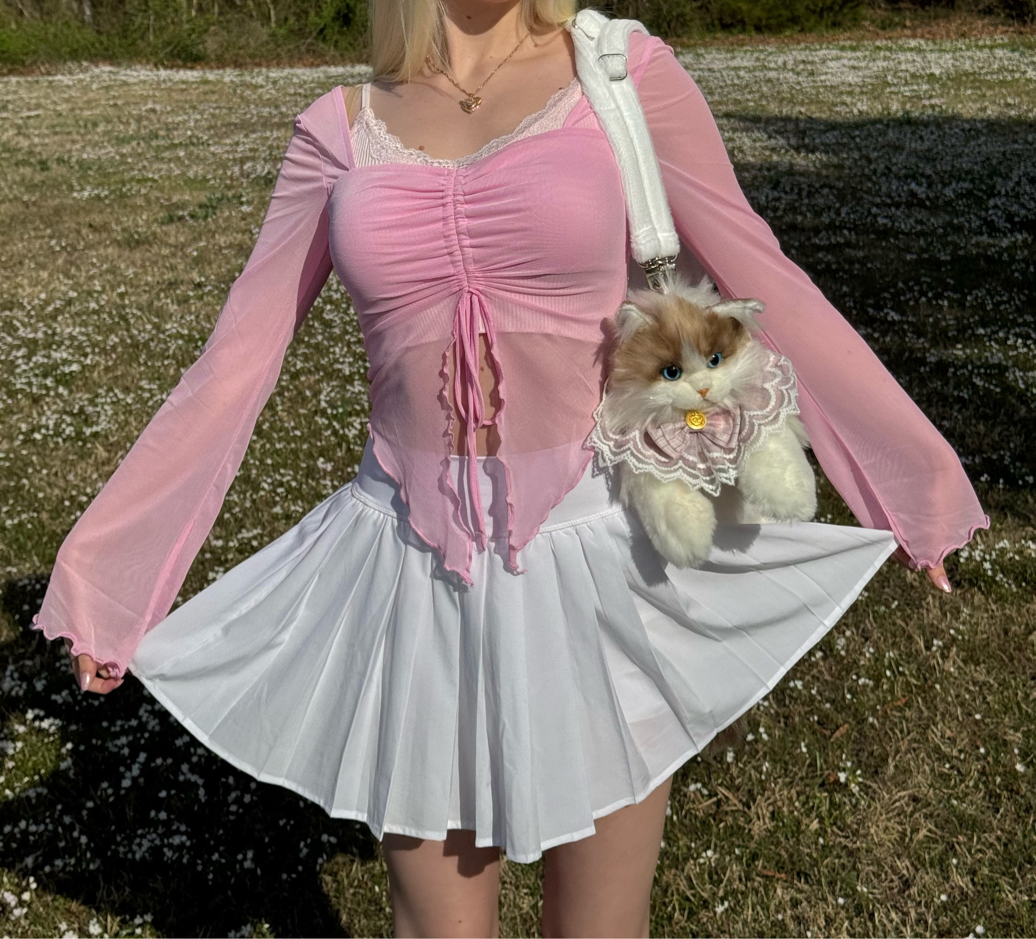 Sharing a cute outfit that has the exact products linked below as well as many cute alternatives! This outfit features a lace cami with a pink mesh long sleeve over top. Also included in this outfit is an adorable cat purse and a white pleated skirt. 🐈💕✨

#LTKfindsunder100 #LTKfindsunder50 #LTKsalealert