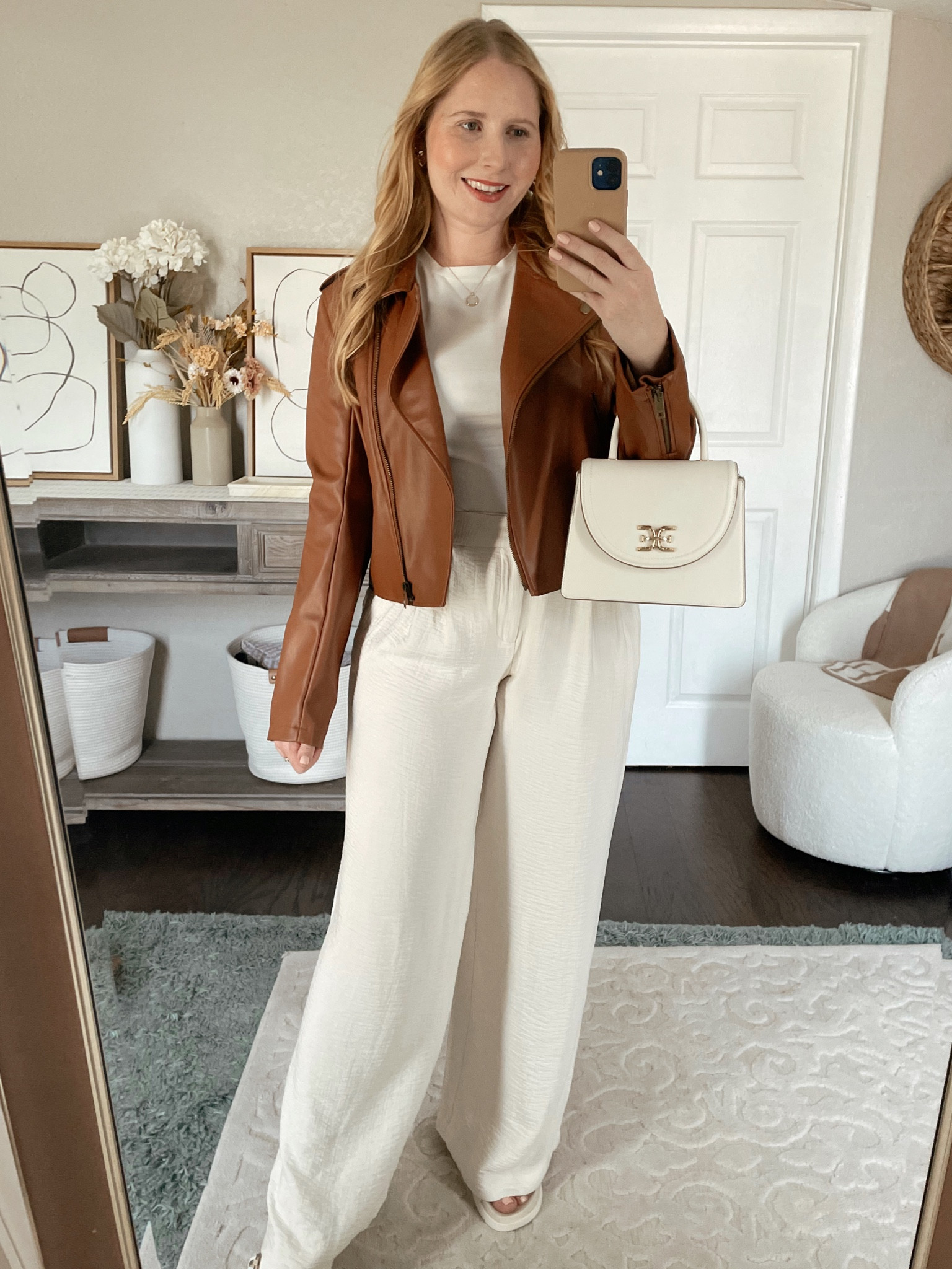 Brown faux leather jacket (size M) cream wide leg trousers (size 8, size down 1) 

#LTKFind #LTKunder50 #LTKsalealert