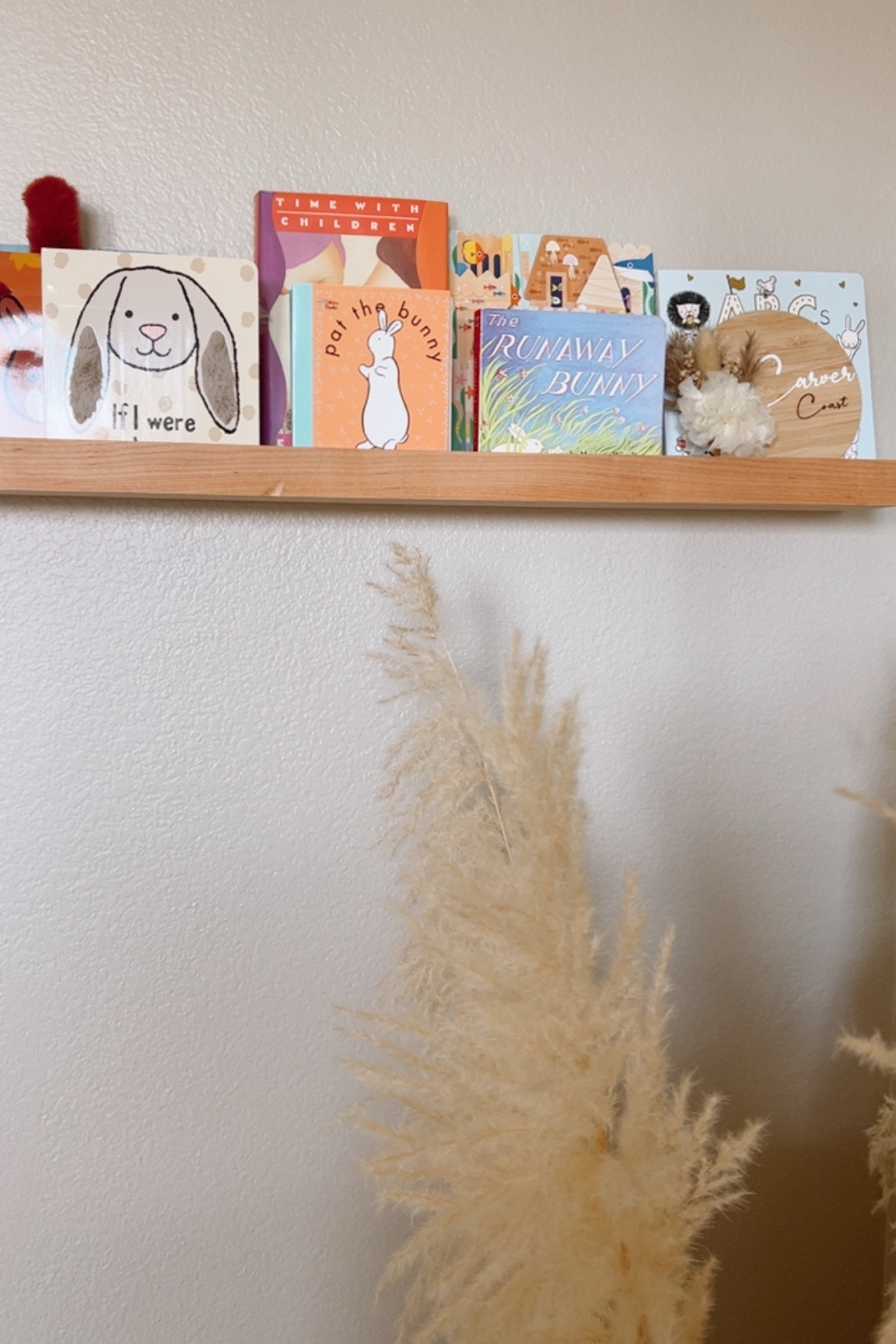 Nursery floating book shelf 📚

SO impressed with the quality & ease of installation. I would love to add more shelves in the future as her book collection grows. I love that these can also be styled with picture frames in other areas around the home so they are versatile & can grow with your kids! 

#LTKBaby #LTKHome