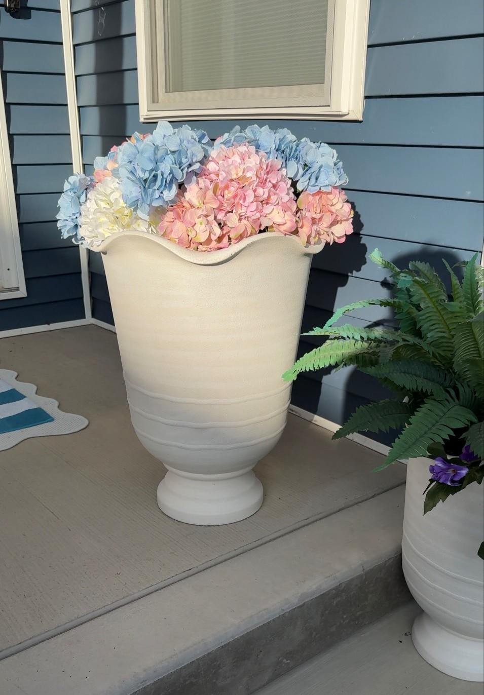 These scalloped urn planters from Lowe’s are SO good! 

#LTKHome #LTKSeasonal