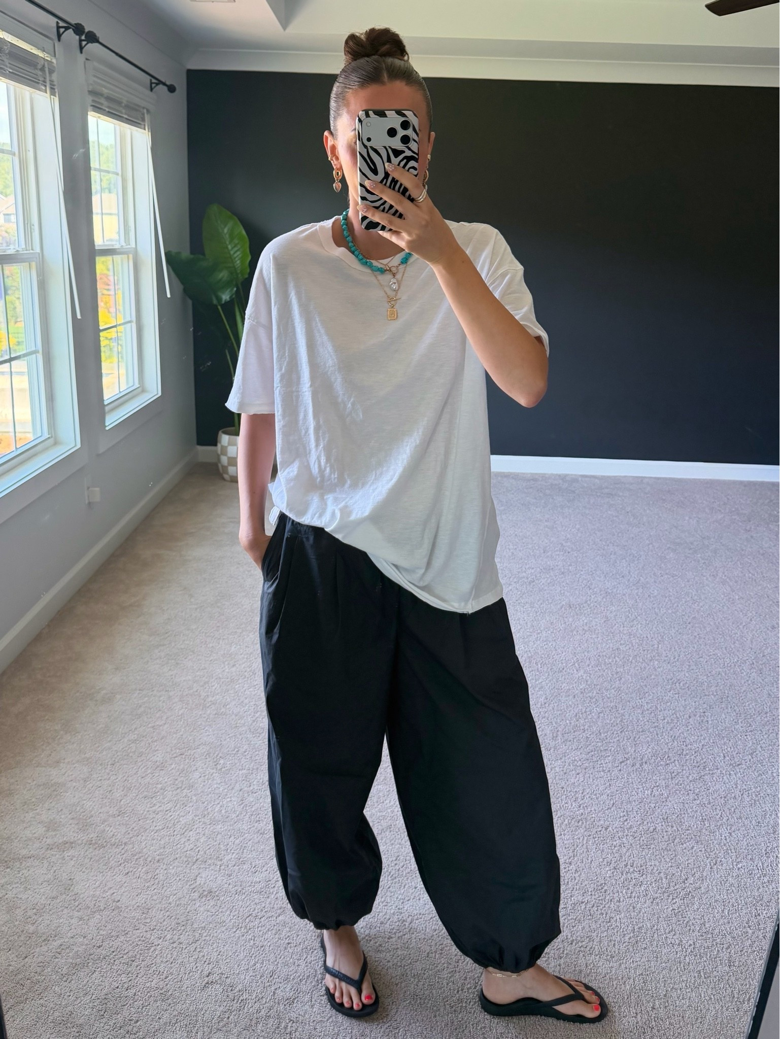 5’9” wearing size medium oversize white tee top and gray balloon pants bottoms

#LTKootd #LTKTall