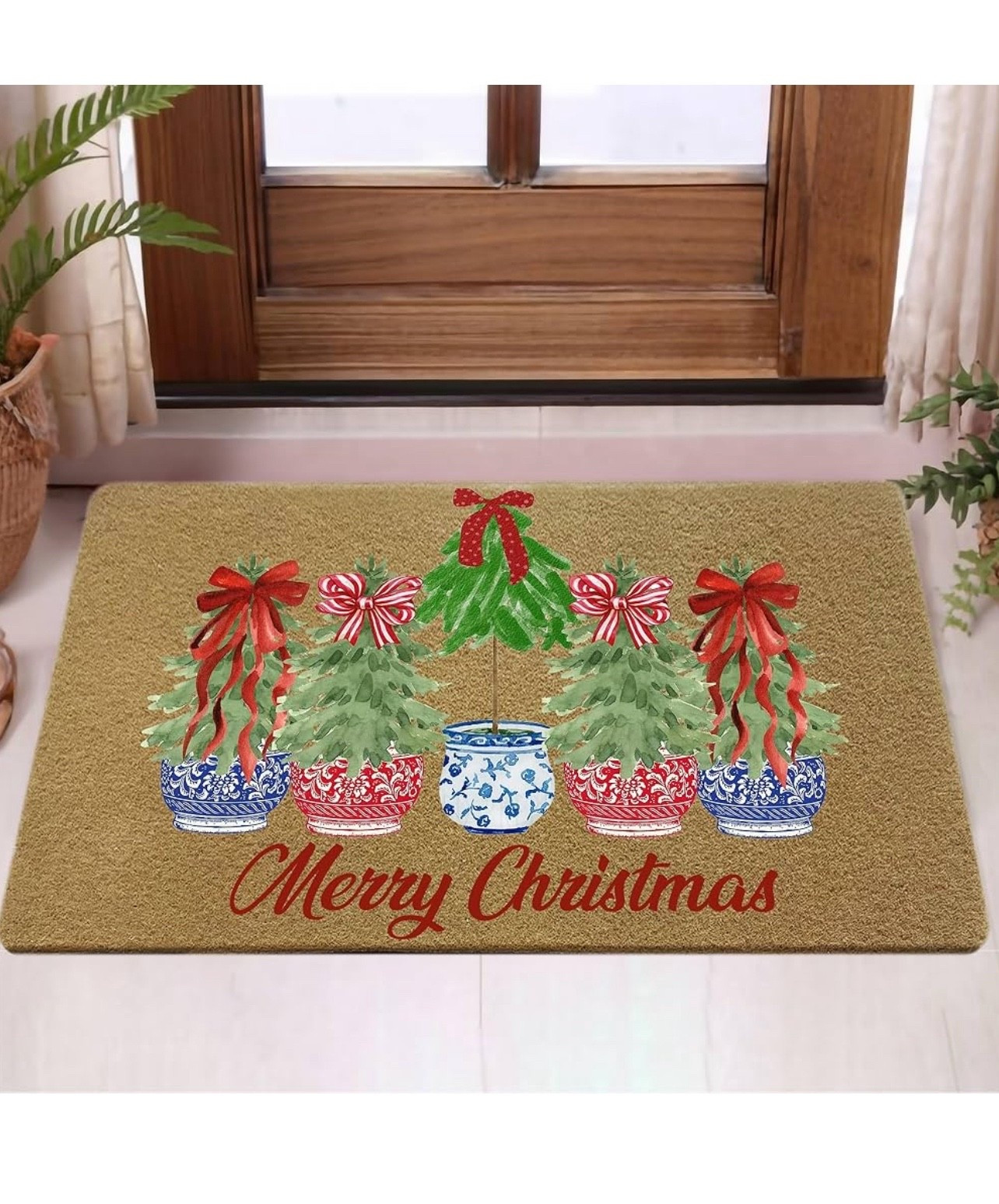 Chinoiserie Christmas Doormat 🎄💙❤️

This adorable Christmas doormat is the perfect way to welcome guests this holiday season! Featuring festive mini trees in red-and-blue chinoiserie pots, candy-stripe bows, and a classic Merry Christmas script, it adds the sweetest preppy-holiday touch to any porch or entryway. The coir texture is great for wiping shoes, and the print looks so cute layered over a larger outdoor rug for that styled front-porch look. Such a fun, budget-friendly way to bring holiday cheer to your doorstep! 🎁✨

holiday decor • Christmas porch decor • red & blue chinoiserie Christmas • doormat styling ideas • cozy holiday home • festive front porch • outdoor Christmas decorations • holiday door mat • Merry Christmas decor • entryway decor • seasonal home accents • Amazon holiday finds 🎄💙

#LTKHoliday #LTKFindsUnder50 #LTKHome